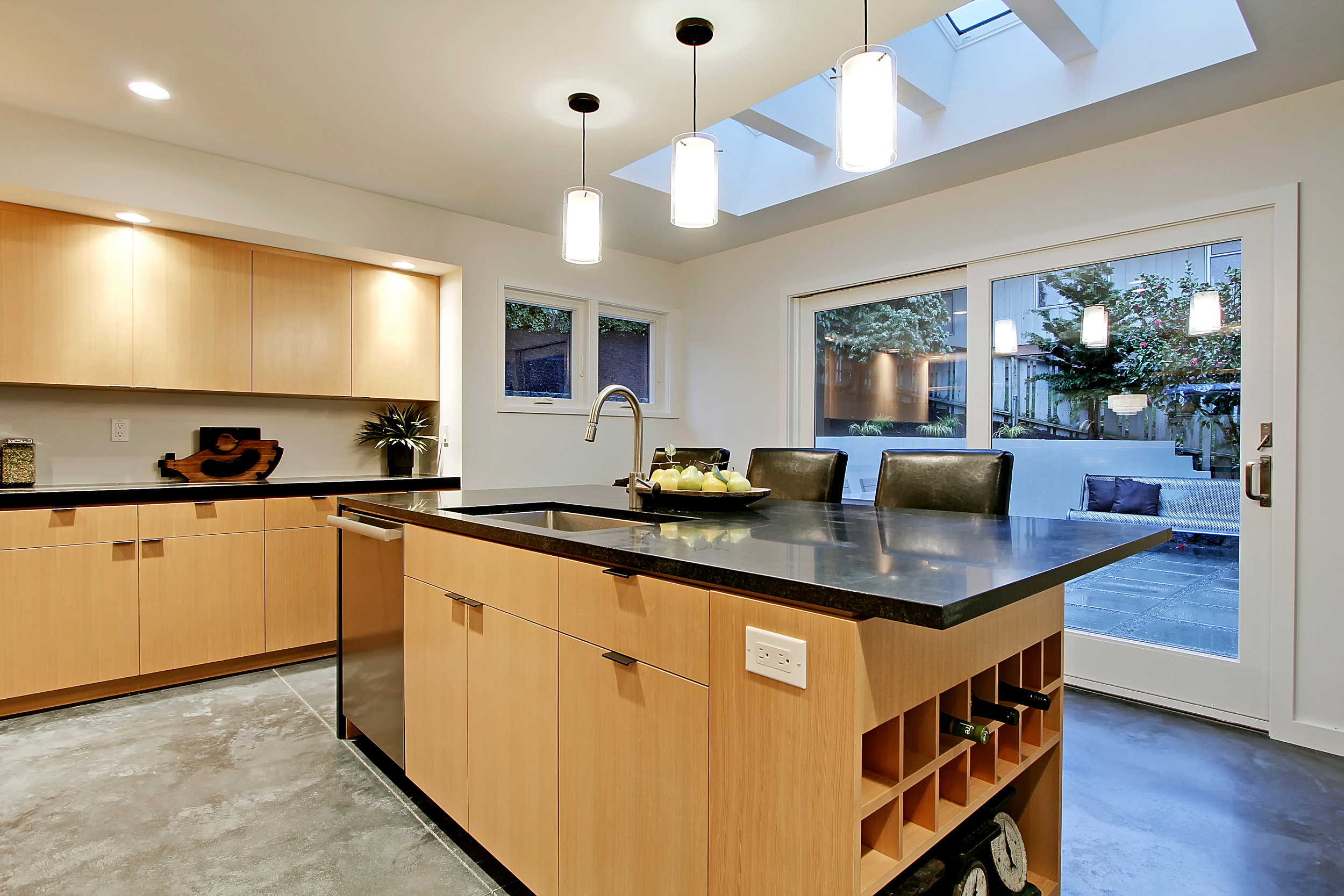 Skylights Above Kitchen Island Seating Area