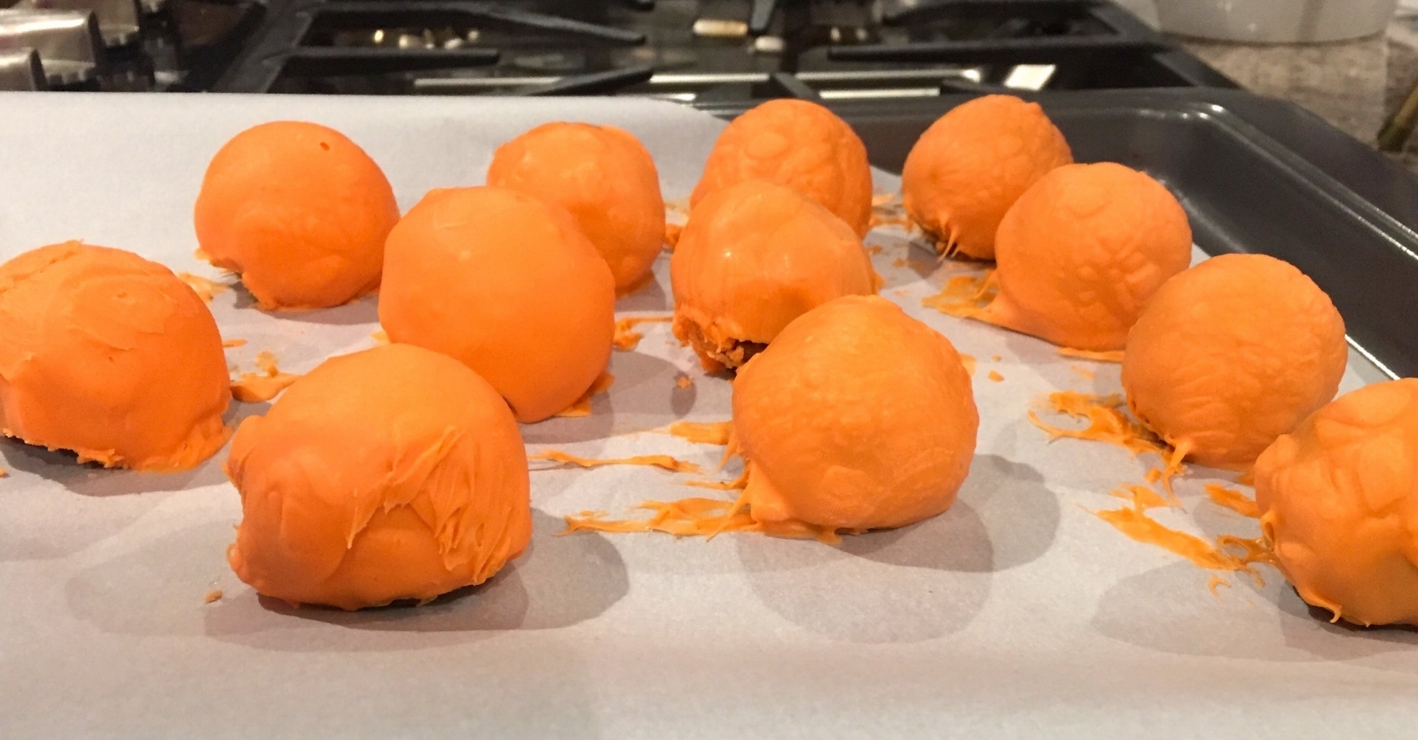 These truffles got some fridge time! Better, but the overheated candy melts bunched together on each truffle. 