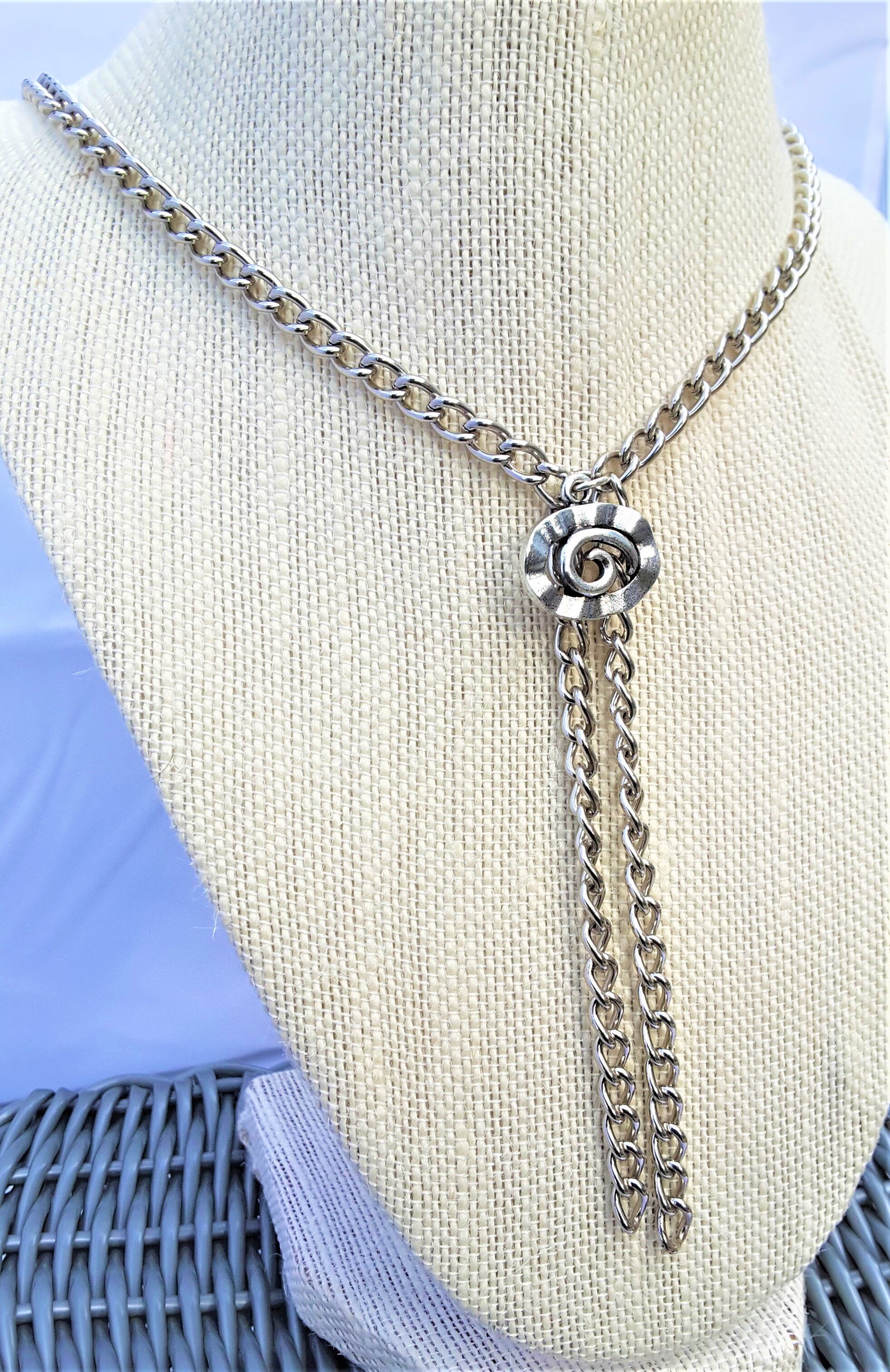 Swirly metal charm necklace.jpg