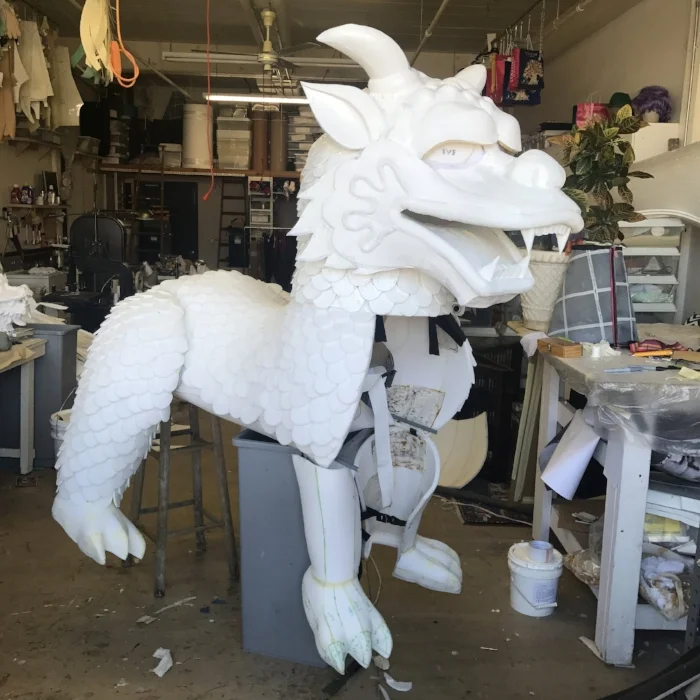  6ft tall 'Qilin' Chinese dragon: design, patterned, and built by Laura Manns for Grace Chang. Harness and kinetic hip joints made by Terry Conrad and Sam Hill [project manager]. Scale fabrication help from Zoë Allen. Shown here before getting final 