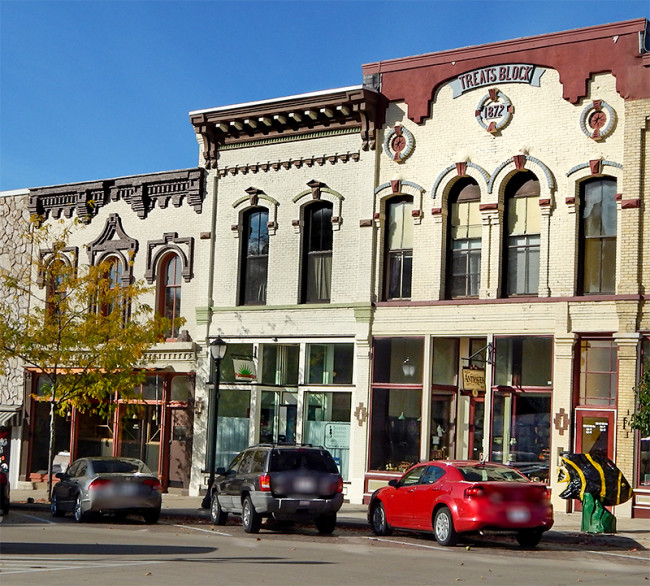 Antiques-Shop-in-building-marked-at-top-TREATS-BLOCK-1872-on-16th-Ave-Monroe-WI-650x586.jpg