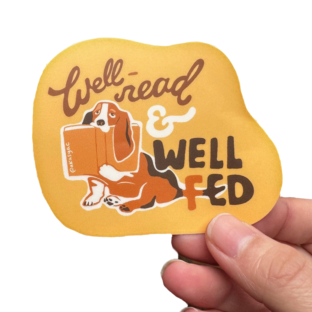 Well+Read+and+Well+Fed+beagle+sticker+in+hand+white+bg.png