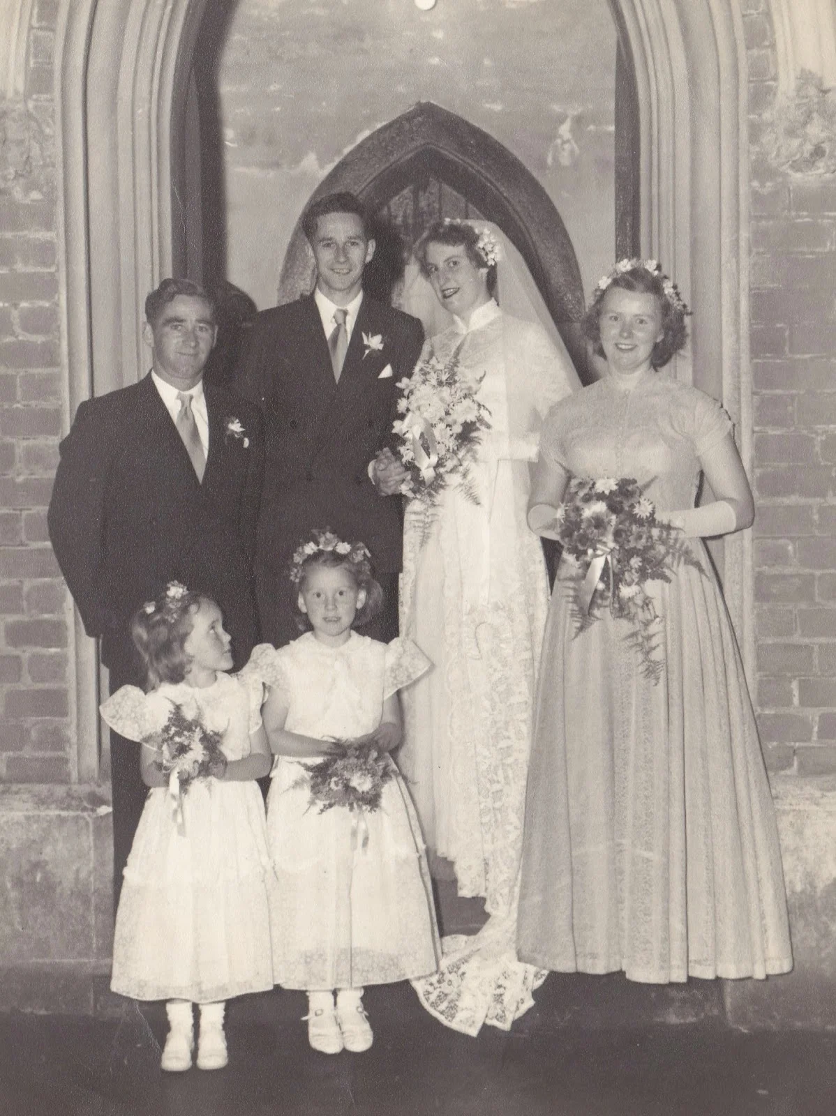 My cute little sister Linda and me are the Flowergirls at our Aunty's Wedding 1951