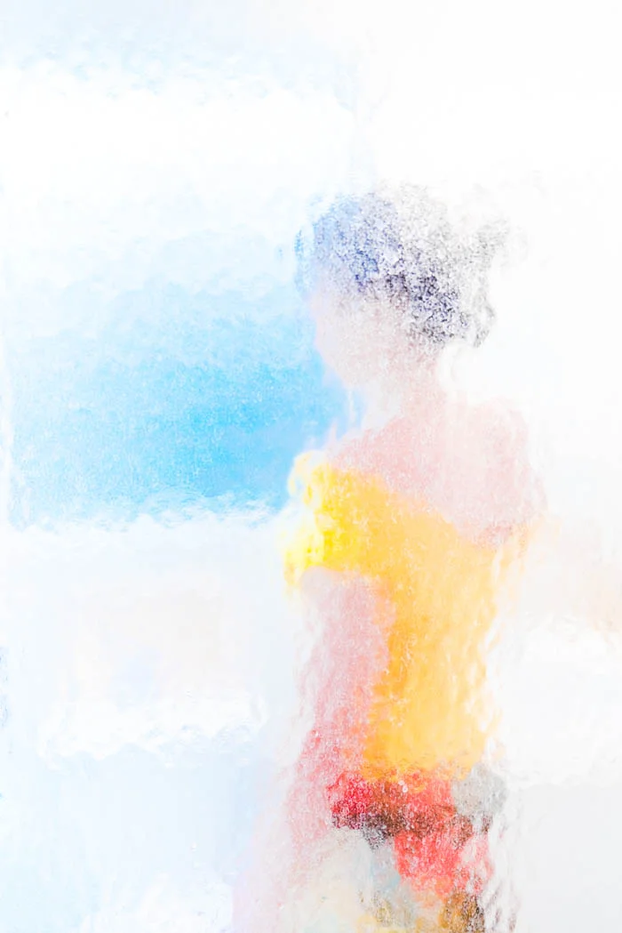 Girl Standing by the Sea