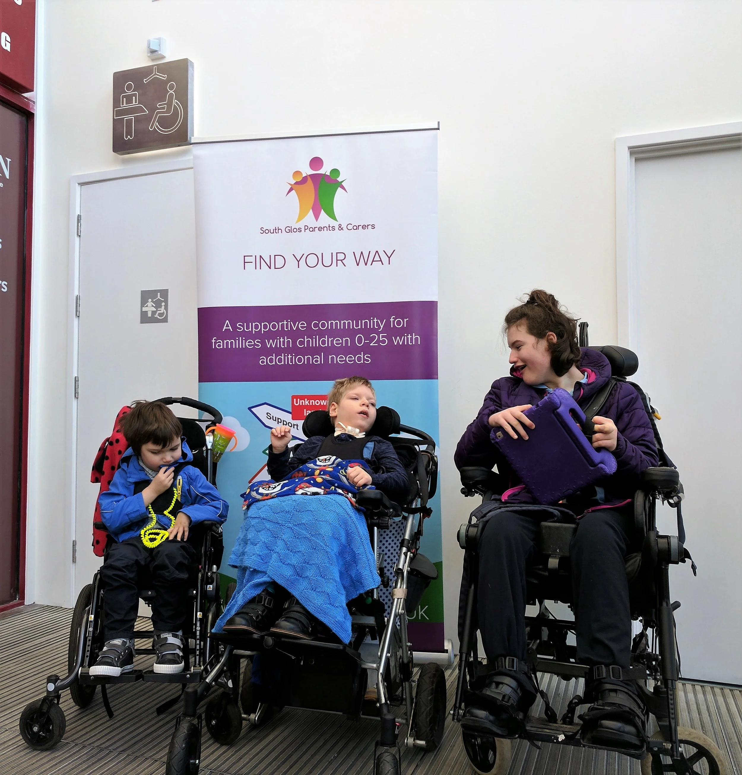 Children and toilet Cribbs with branded banner.jpg