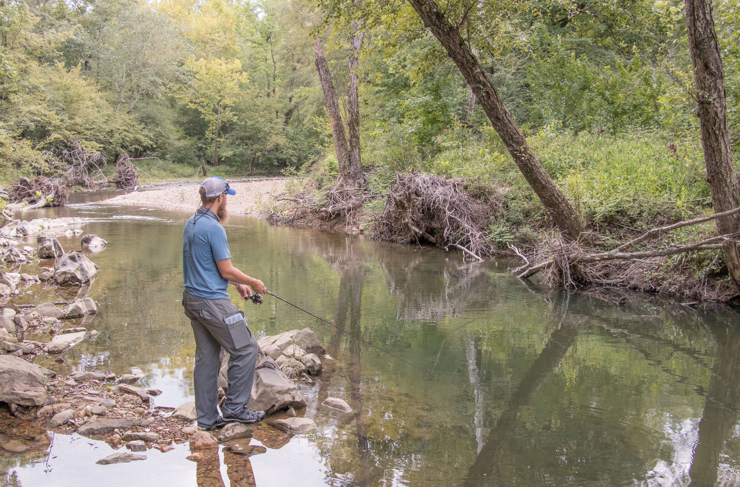  Van fishes a picturesque cut-bank 