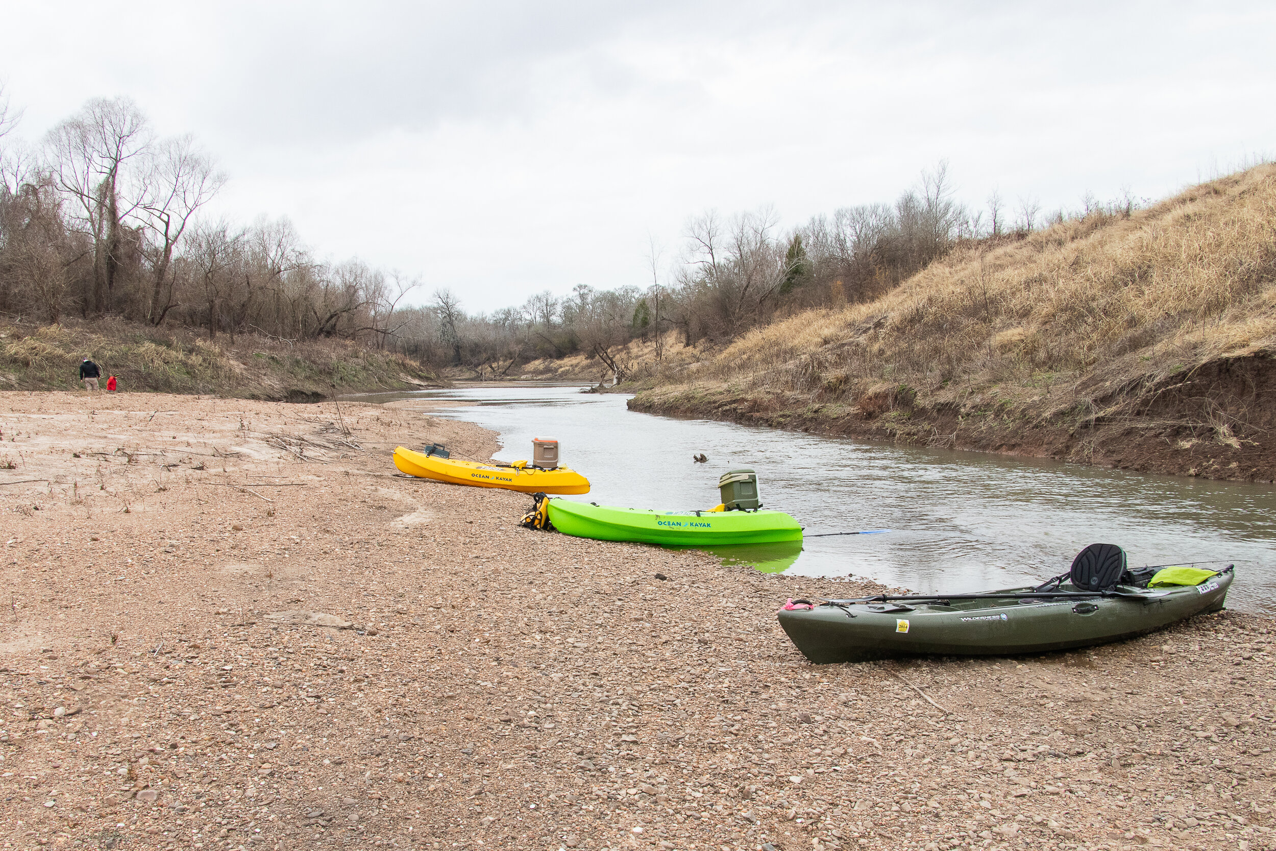  Taking a break along a gravel bar while floating a tributary to the Brazos River. 