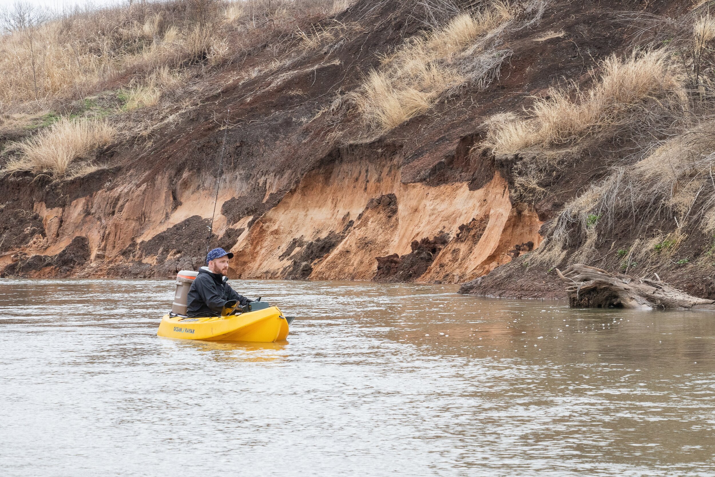  Kyle Hampton floats along, enjoying the sights and sounds of a Texas river. 