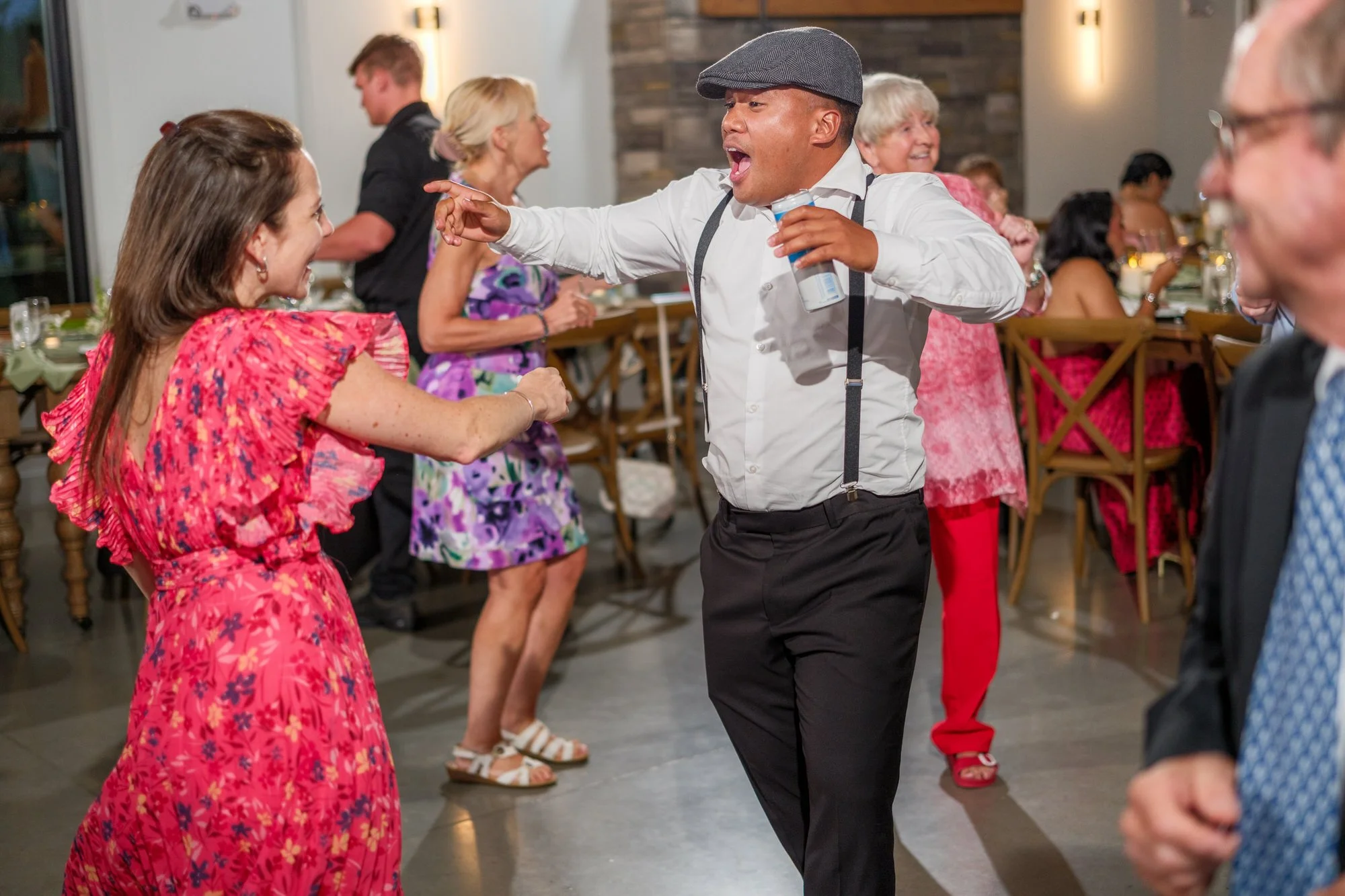 Guests dancing during Hyla Brook Estate wedding reception