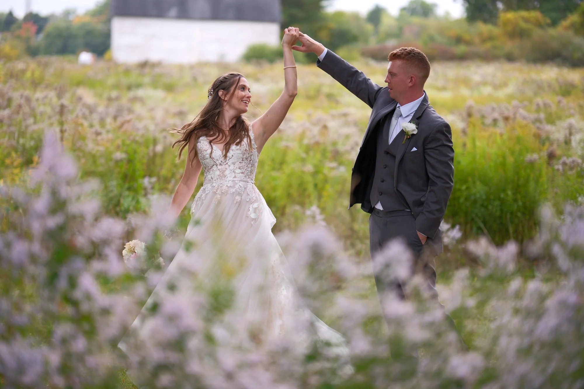 fort-rock-farm-exeter-nh-wedding-couple-wildflower-field.jpg
