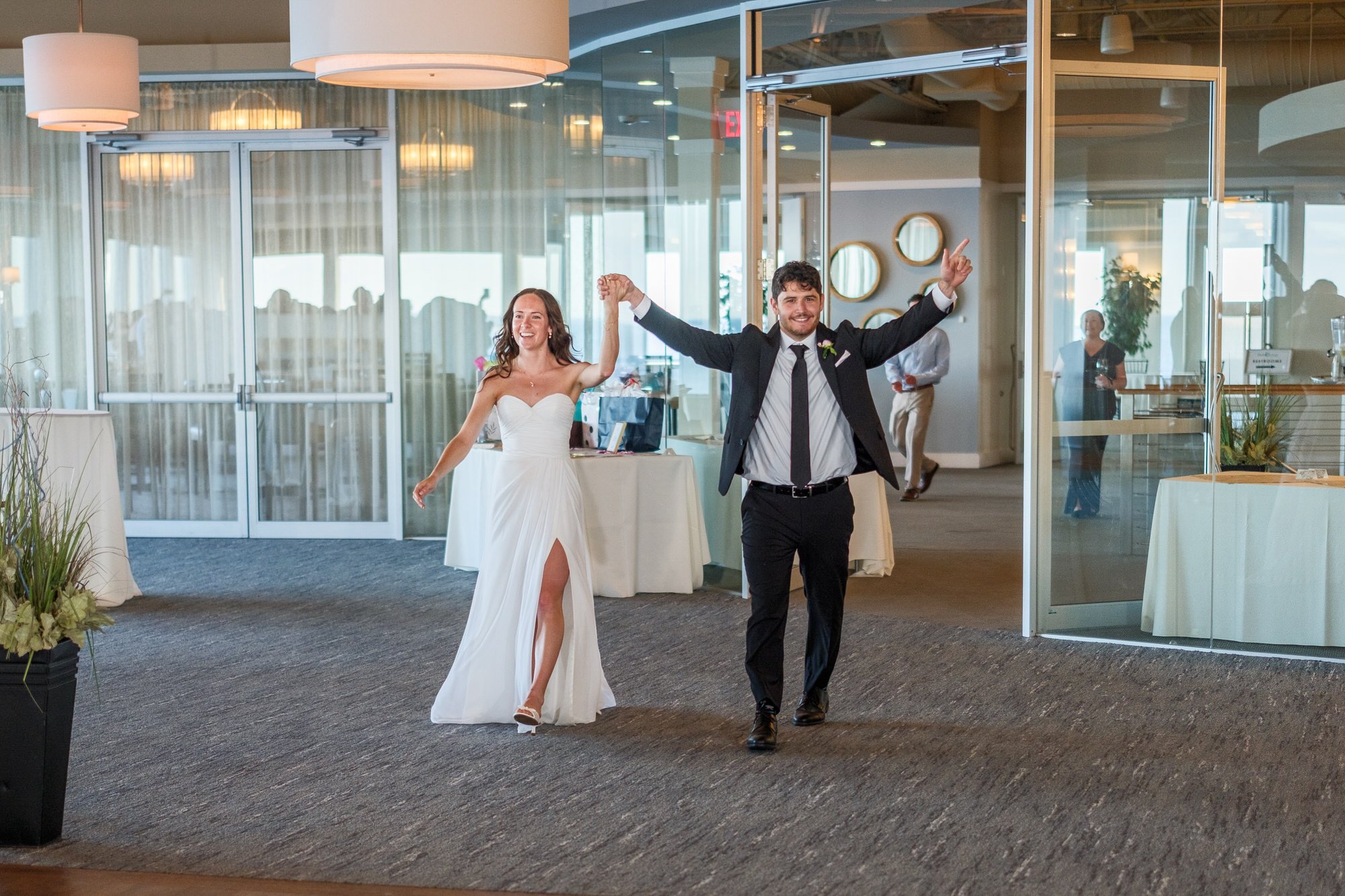 Bride and groom making their reception entrance at Blue Ocean Event Center in Salisbury, MA.