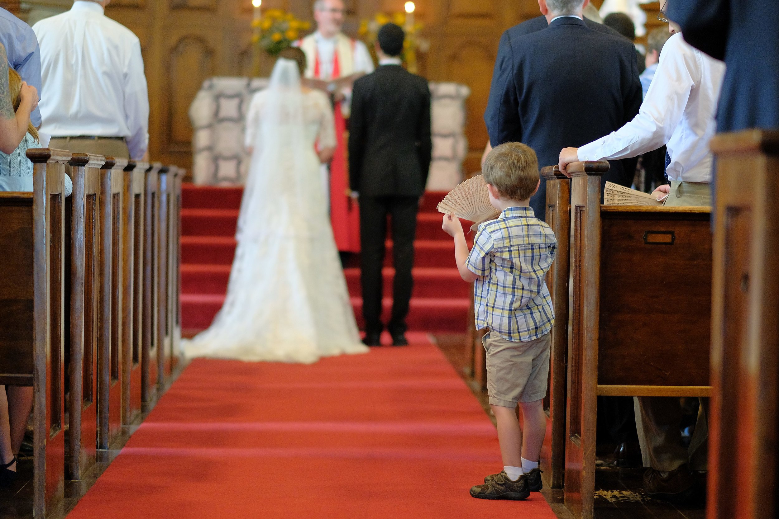 vermont-church-wedding-child-watching-ceremony-candid.jpg