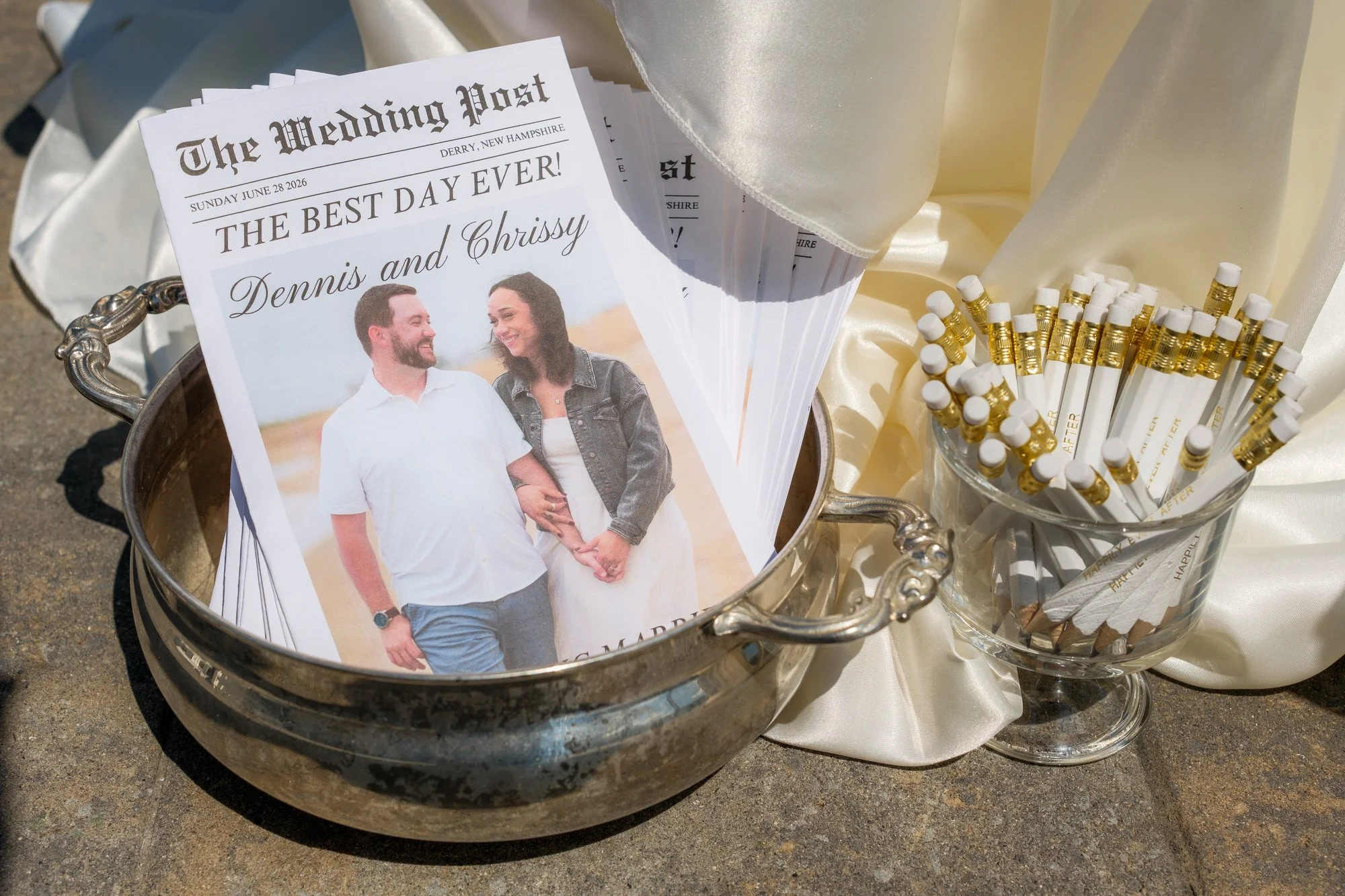 Custom wedding newspaper and champagne details at Hyla Brook Estate