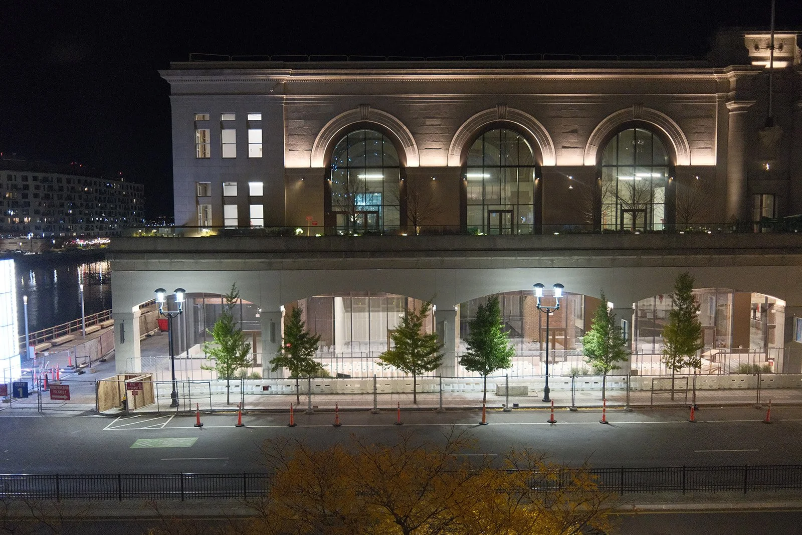 Boston Seaport Hotel exterior illuminated at night, venue of the HCMA 2024 Annual Patient Meeting
