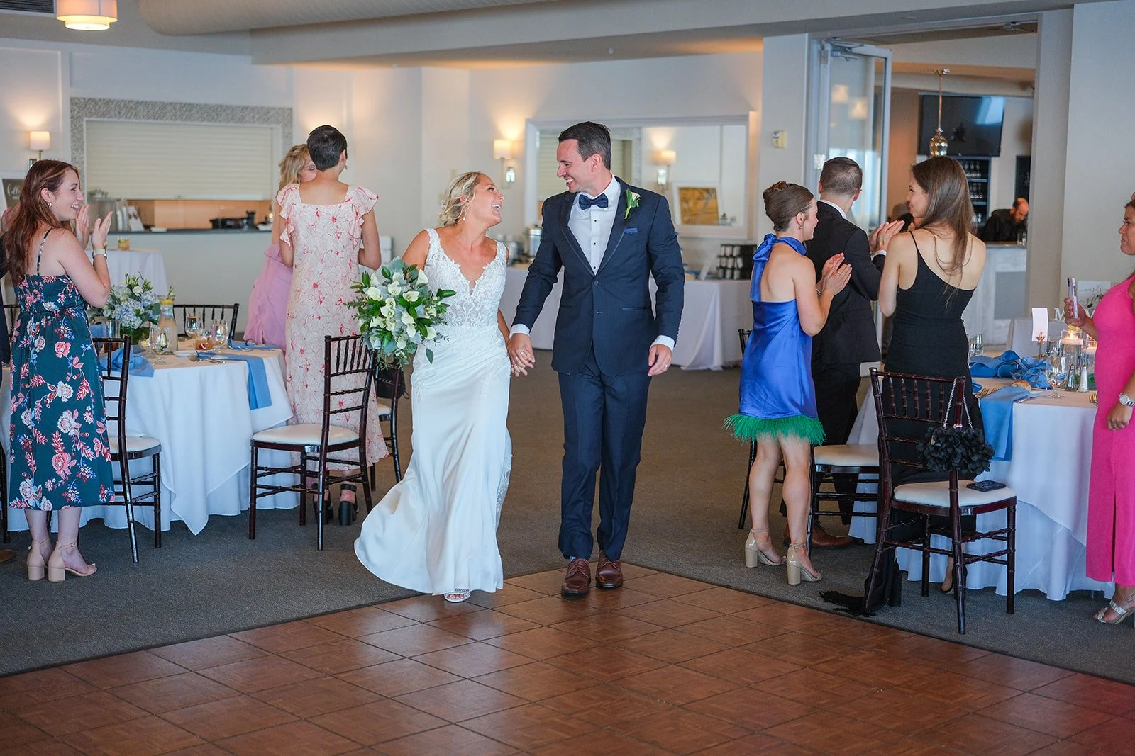 Bride and groom making their grand entrance into the reception hall at Blue Ocean Event Center in Salisbury Beach