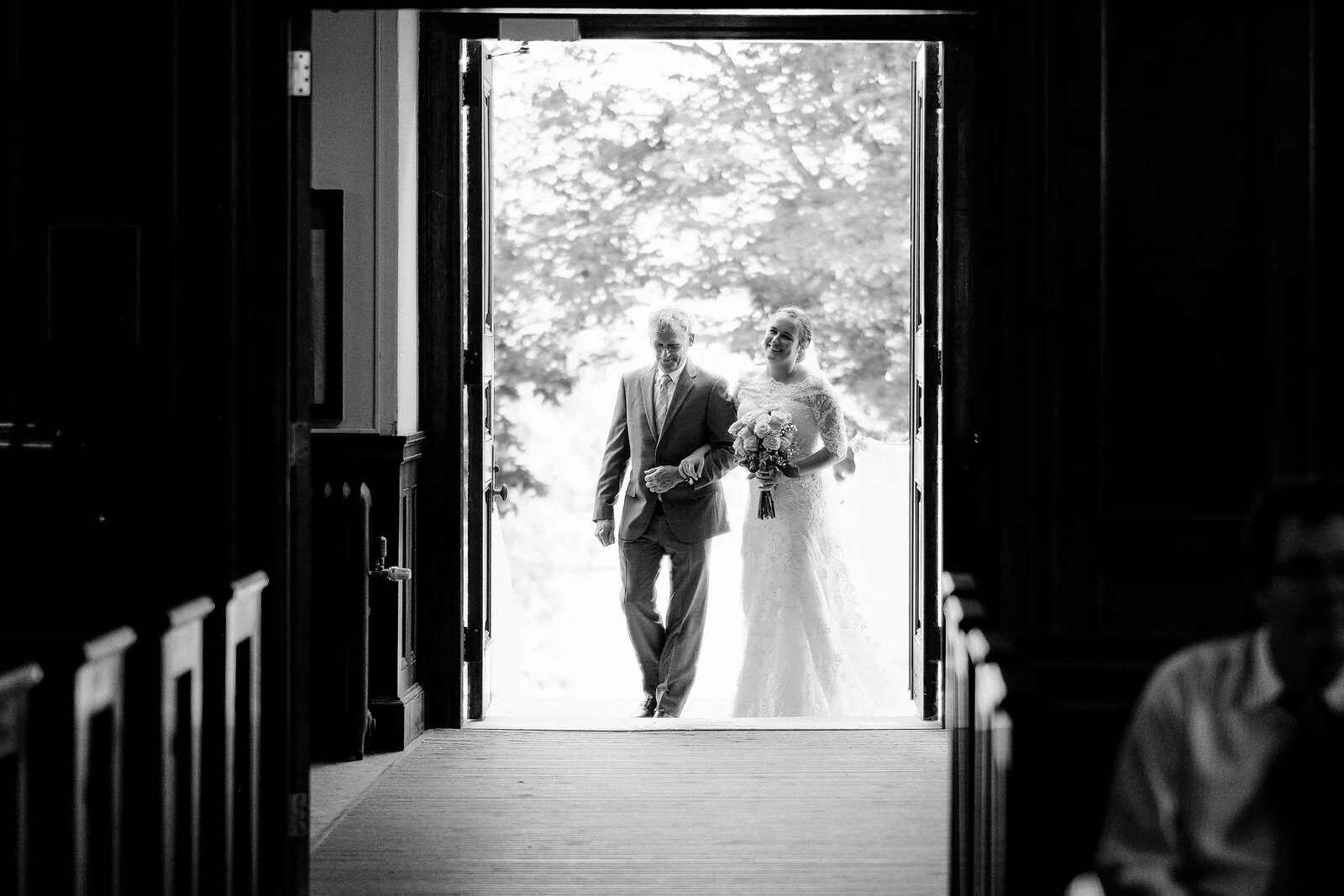 vermont-church-wedding-bride-father-entrance-silhouette-black-and-white.jpeg