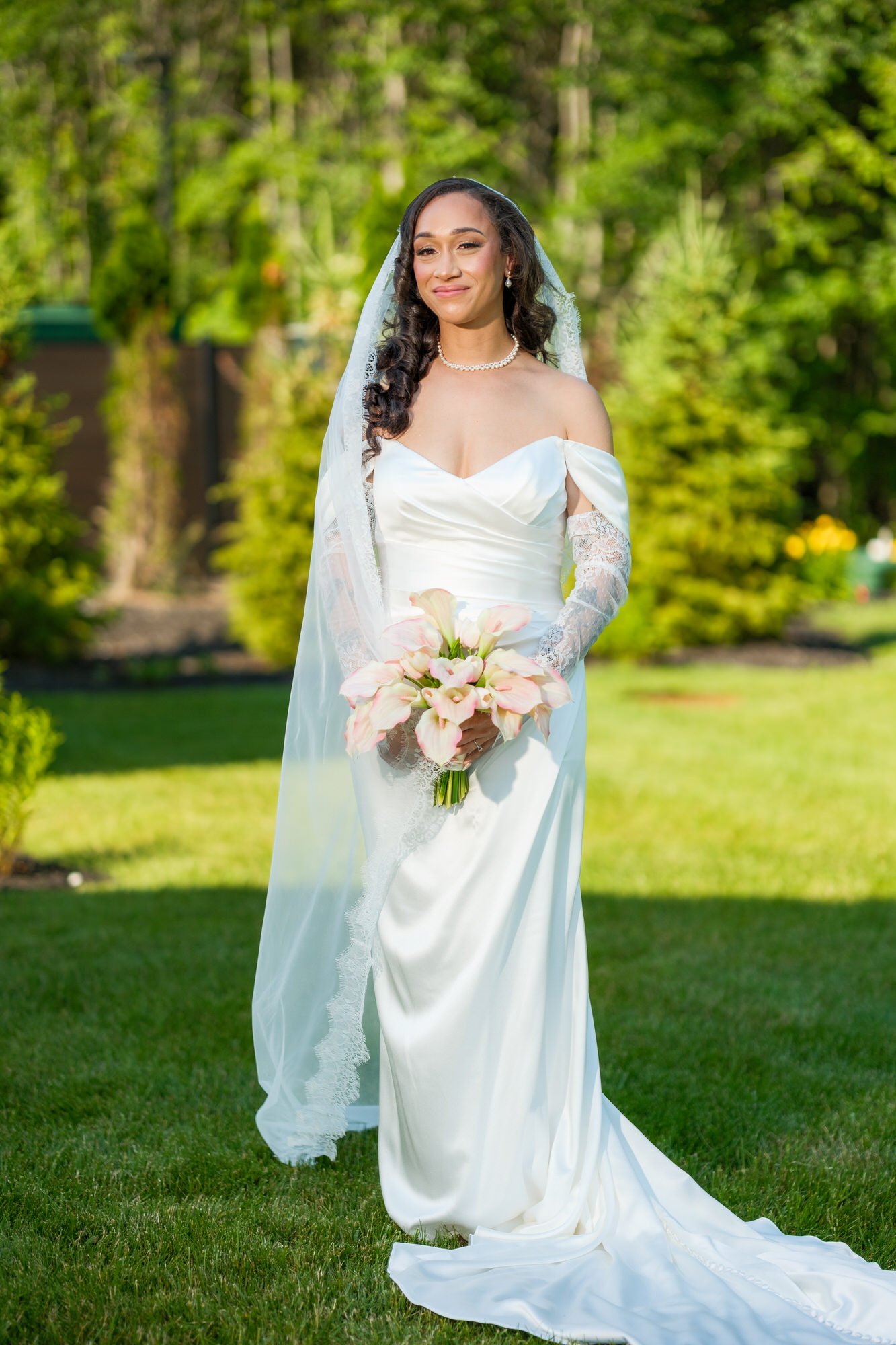 Bride portrait with bouquet at Hyla Brook Estate in Derry, New Hampshire