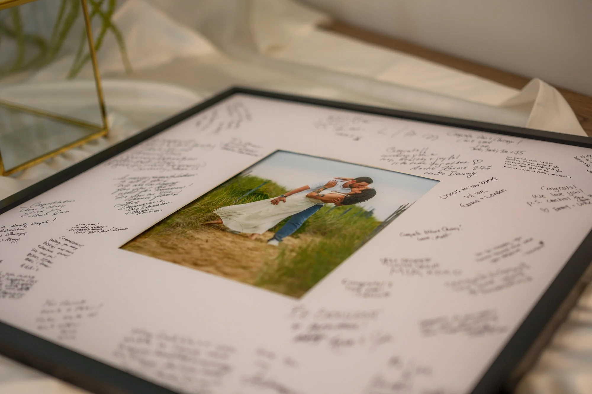Guest book with engagement photo for a Hyla Brook Estate wedding in Derry, New Hampshire