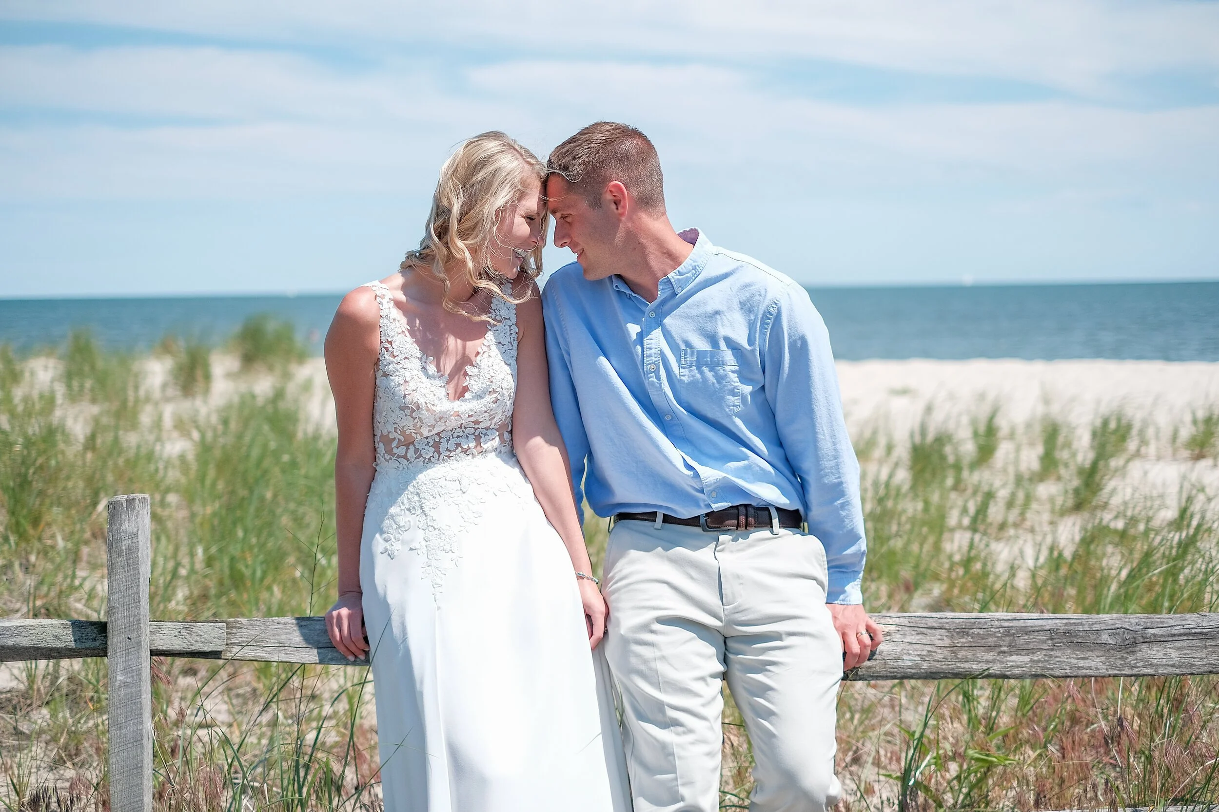 cape-cod-beach-wedding-couple-dune-fence-ma-photographer.jpeg