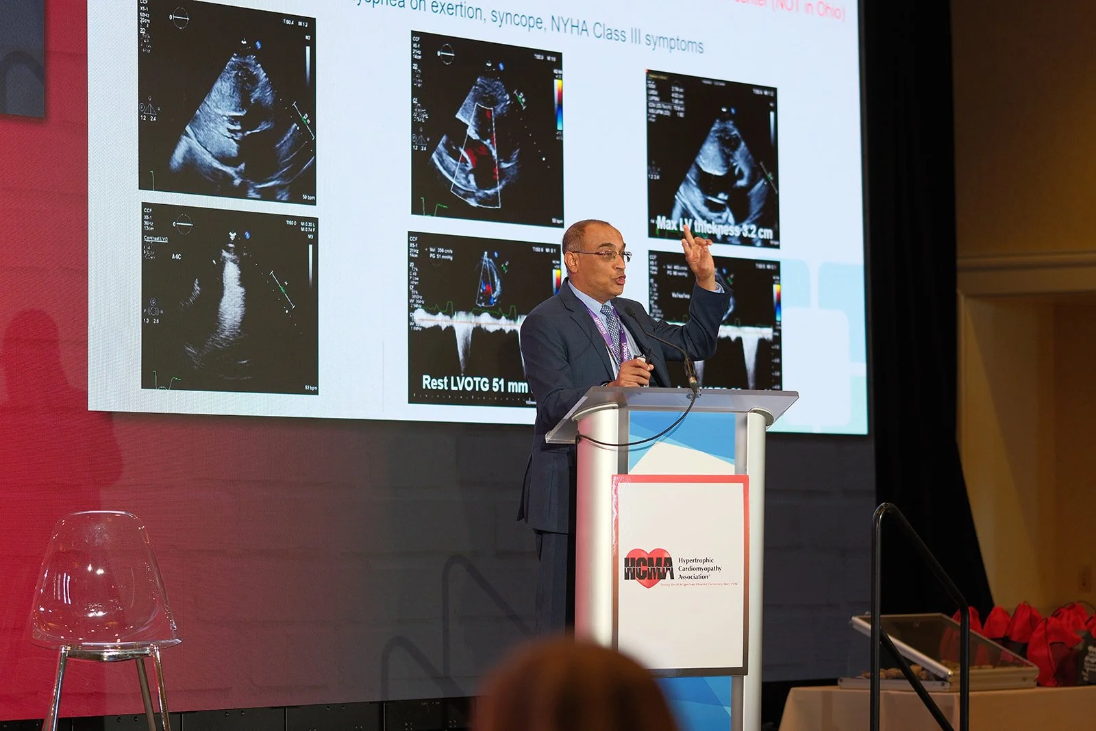 Physician presenter discusses echocardiogram imaging and HCM treatment at the HCMA 2024 Annual Patient Meeting keynote stage
