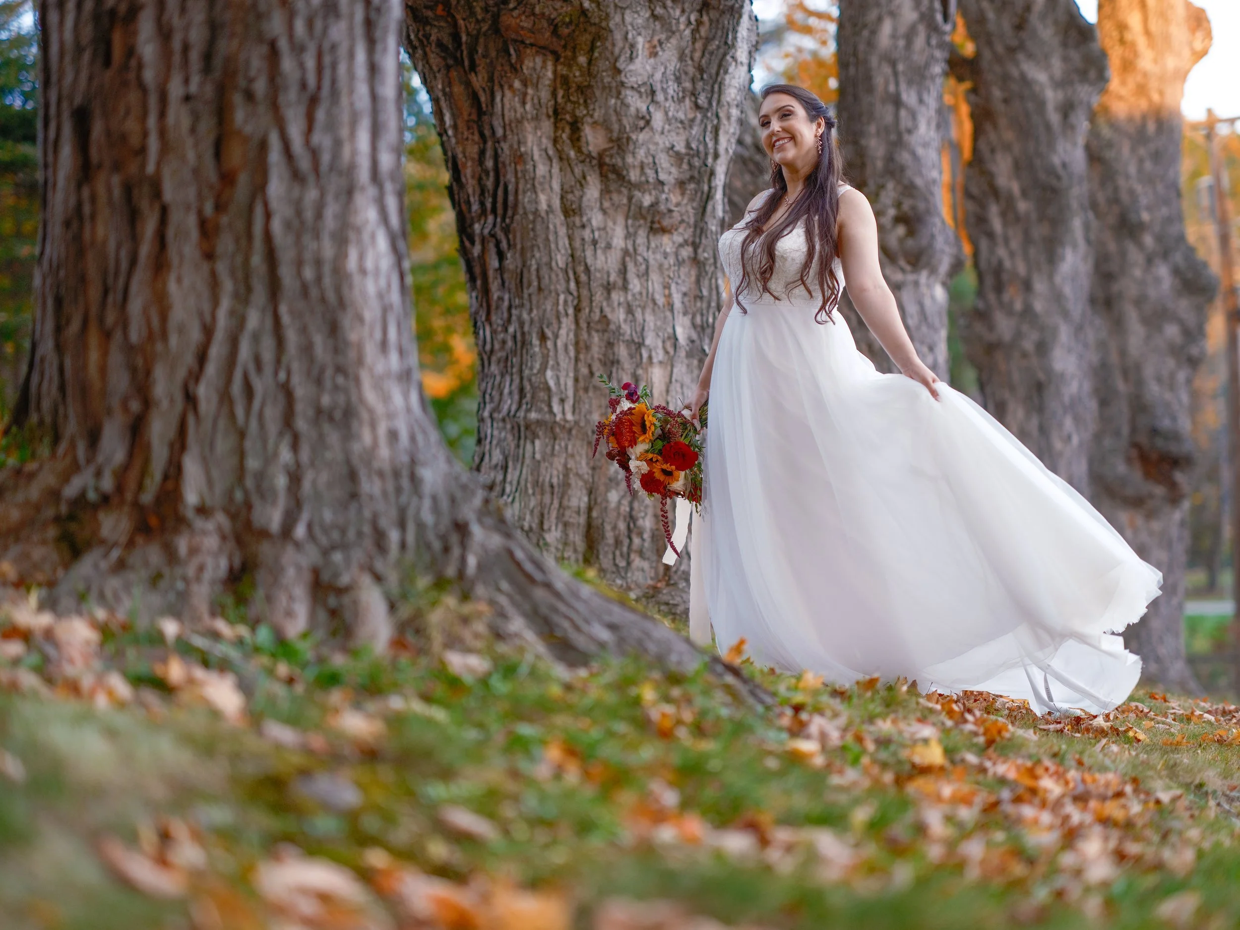 andover-barn-bride-portrait-autumn-leaves-nh-wedding.jpg