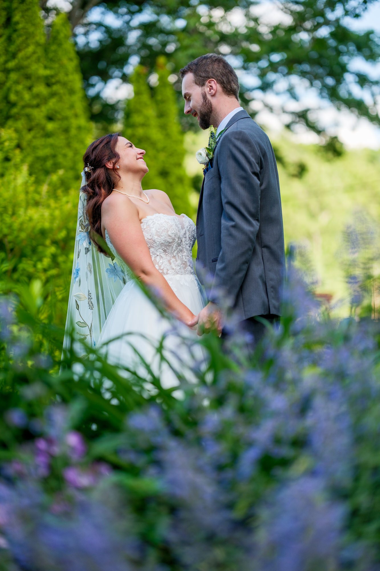 Romantic bride and groom portrait in the gardens at Lake Morey Resort