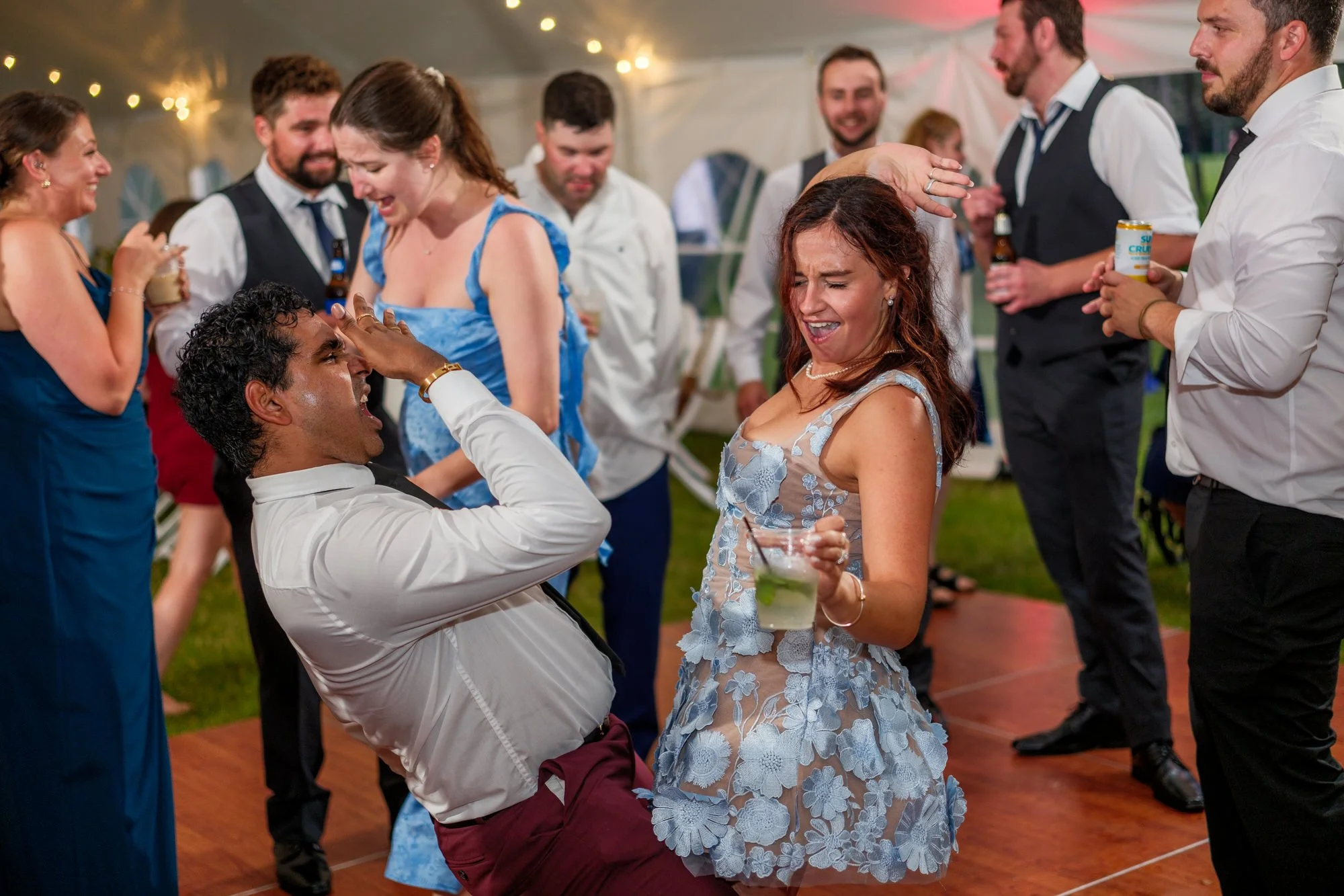 Guest celebrates on the dance floor at Lake Morey Resort wedding reception