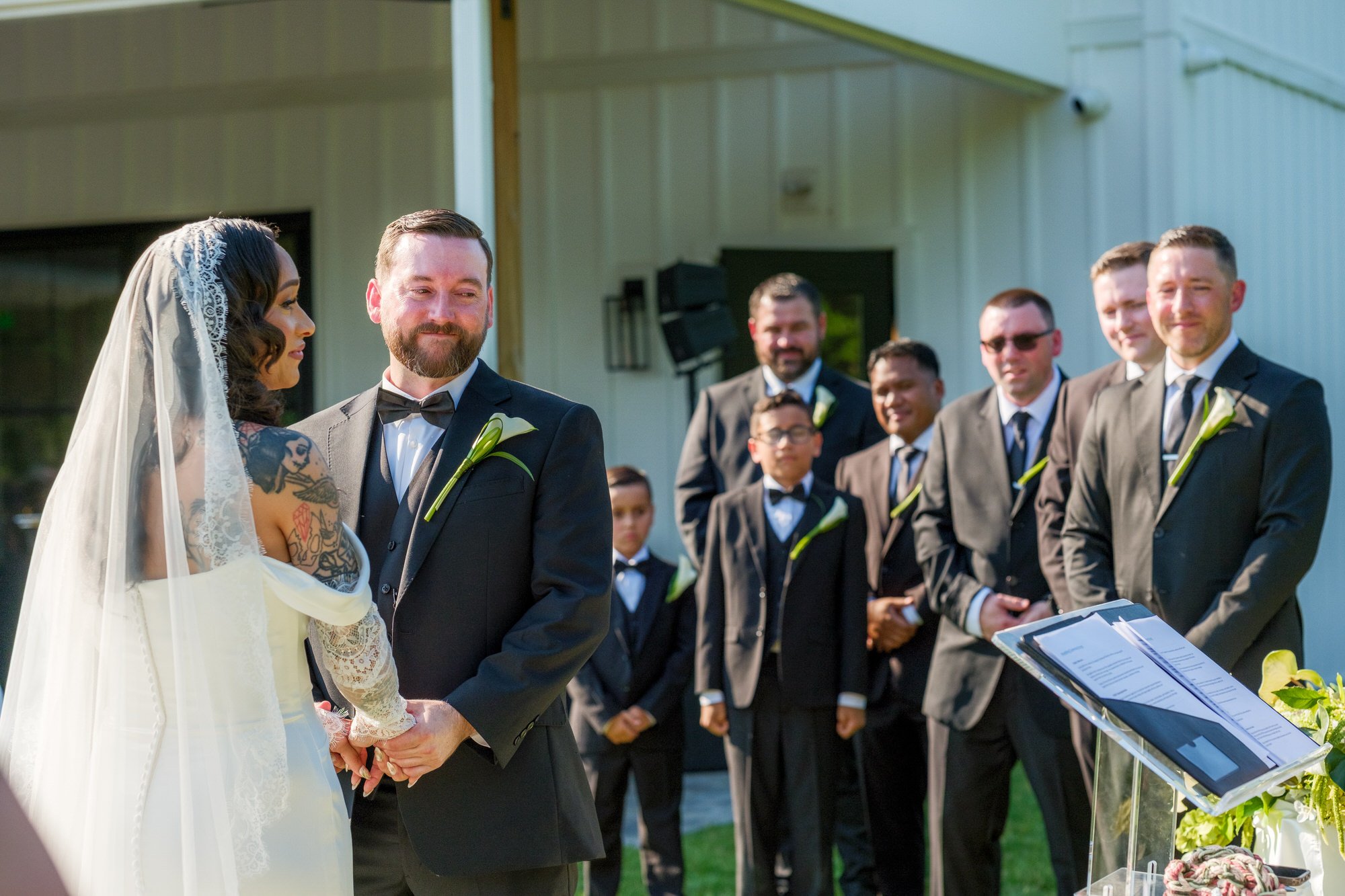Bride and groom at the altar during Hyla Brook Estate wedding ceremony