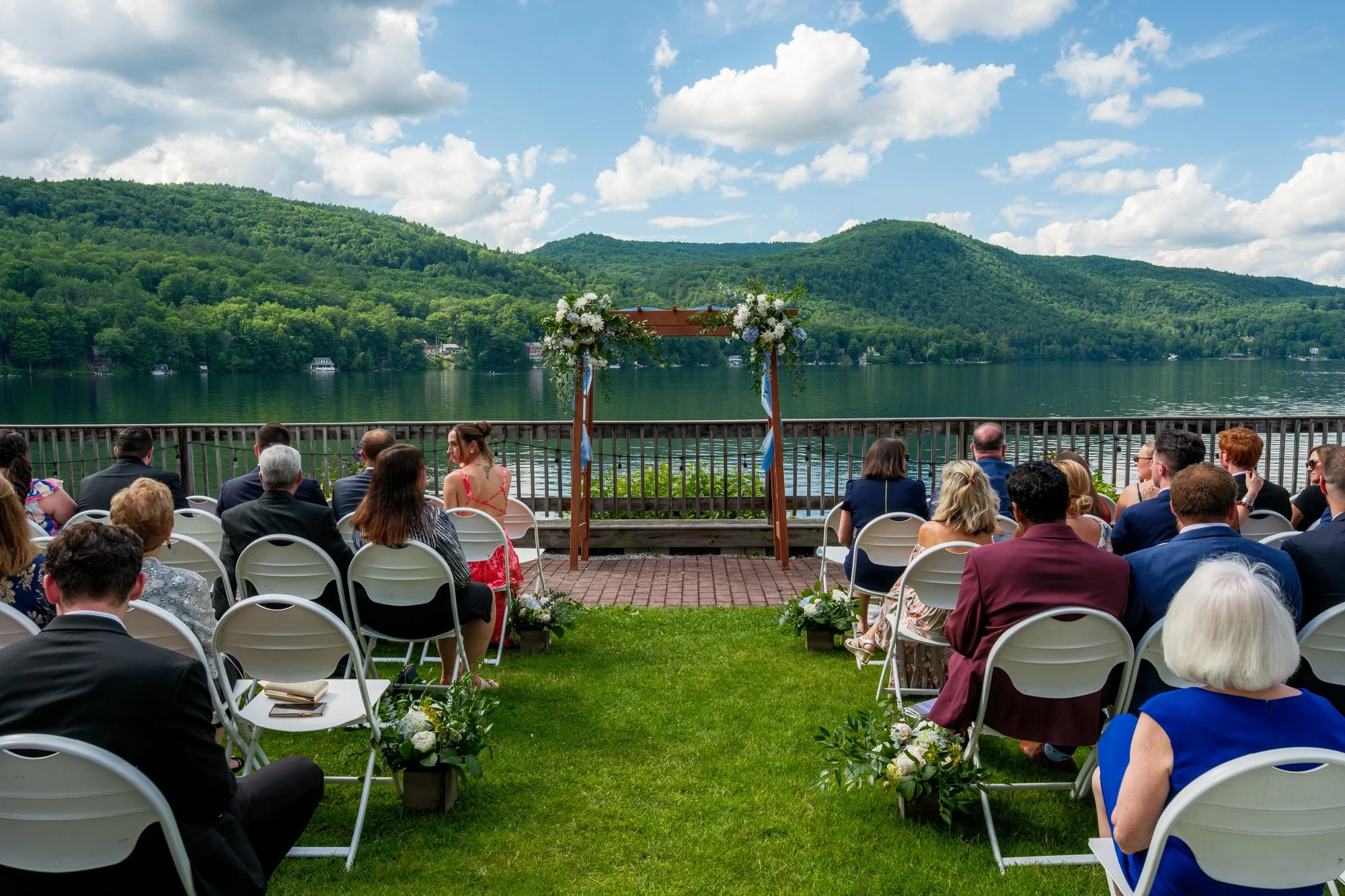 Outdoor Lake Morey Resort wedding ceremony with Vermont mountains and lake views