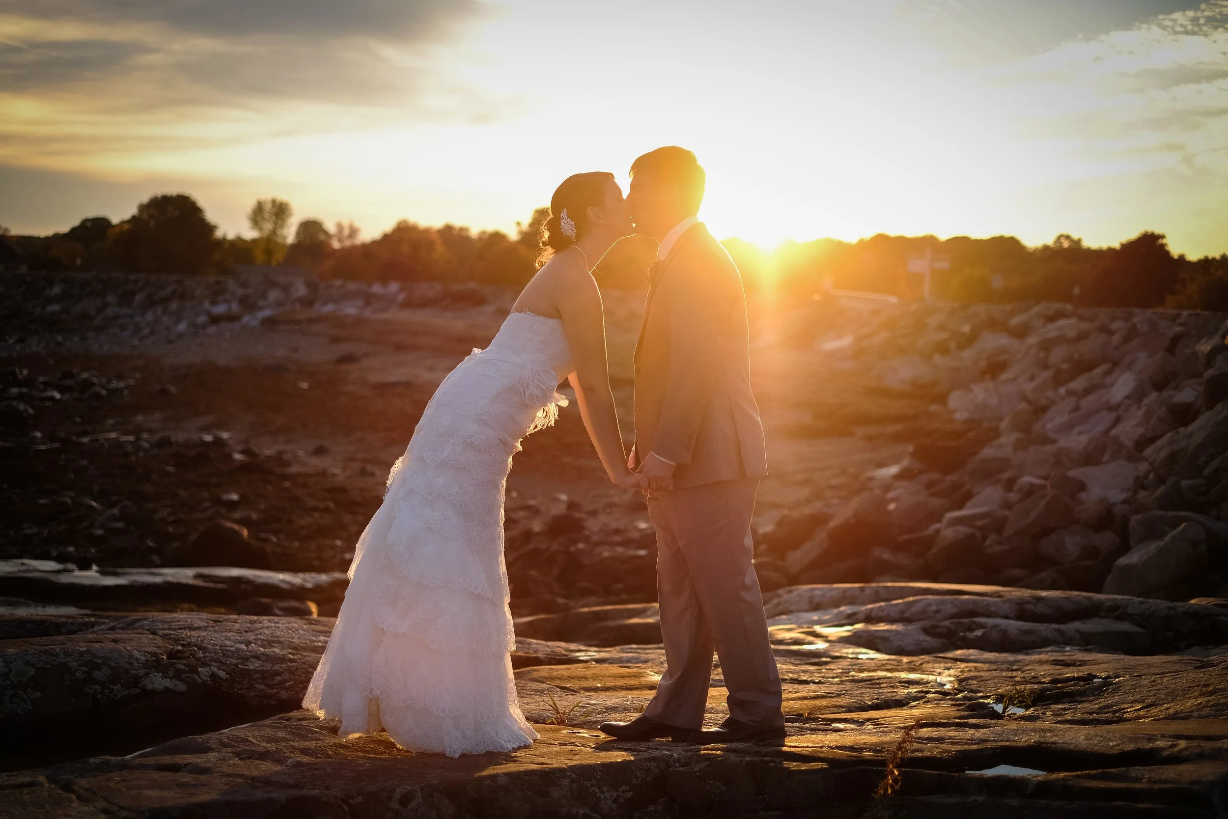 new-england-rocky-coast-sunset-wedding-kiss-nh-photographer.jpg