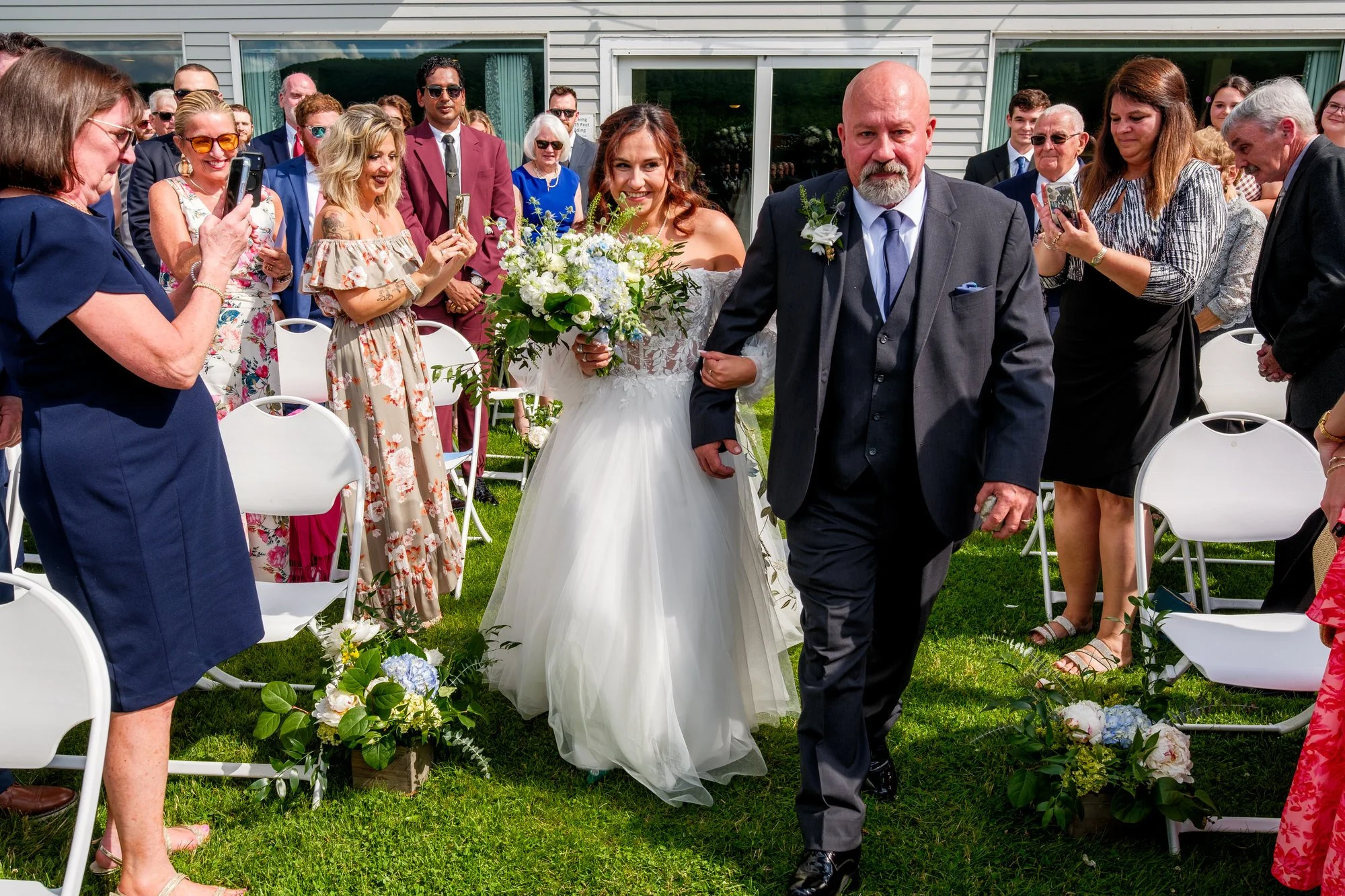 Bride walks down the aisle at Lake Morey Resort wedding ceremony in Vermont