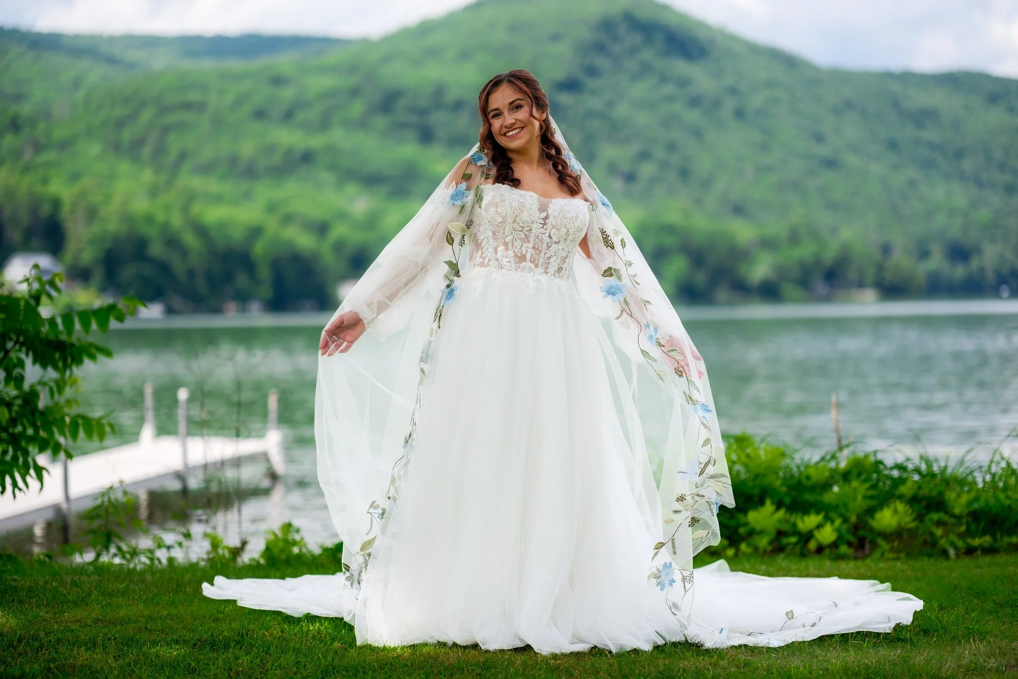 Bride portrait by Lake Morey with Vermont mountain views at Lake Morey Resort