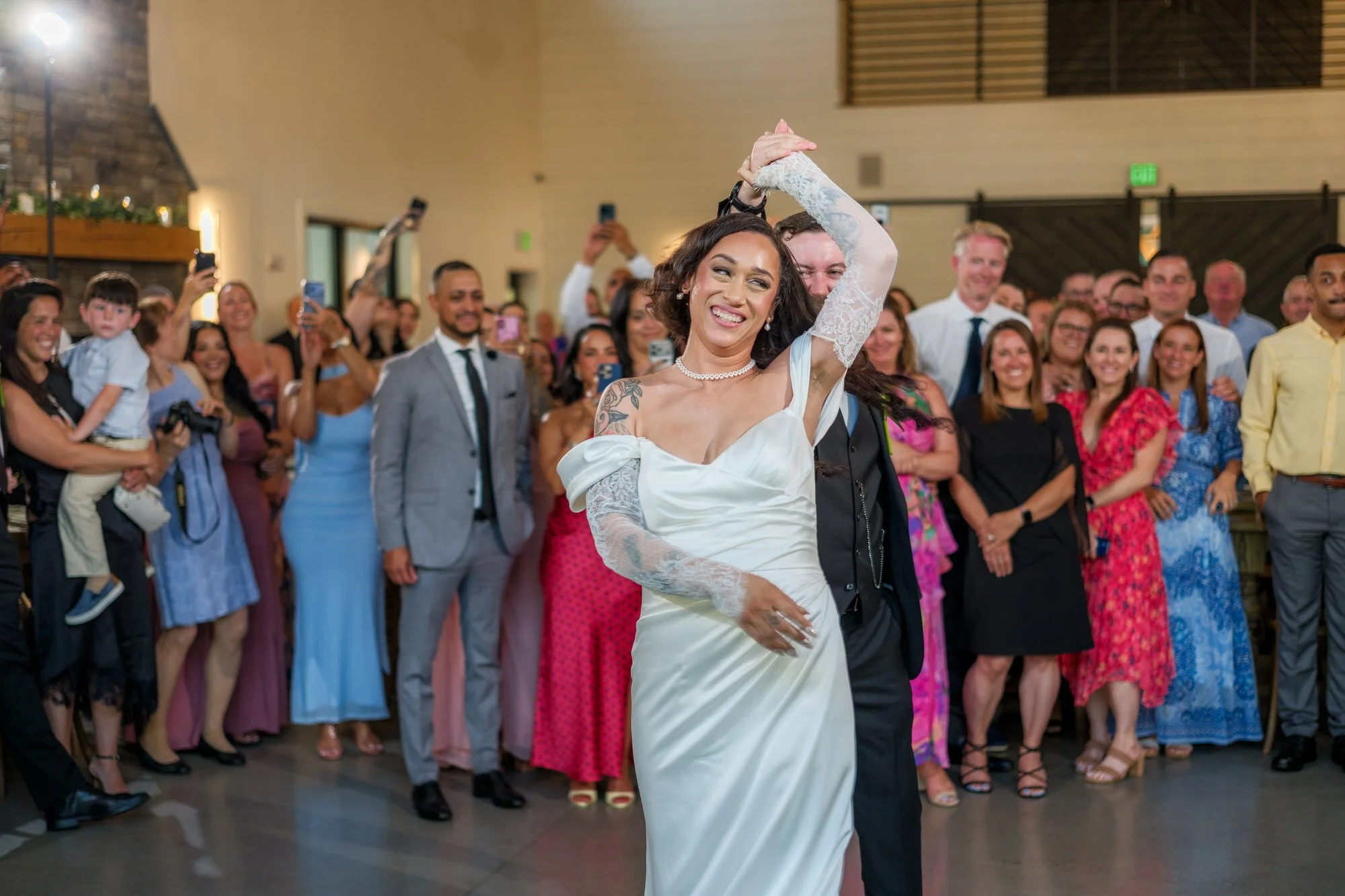 Bride twirling during first dance at Hyla Brook Estate