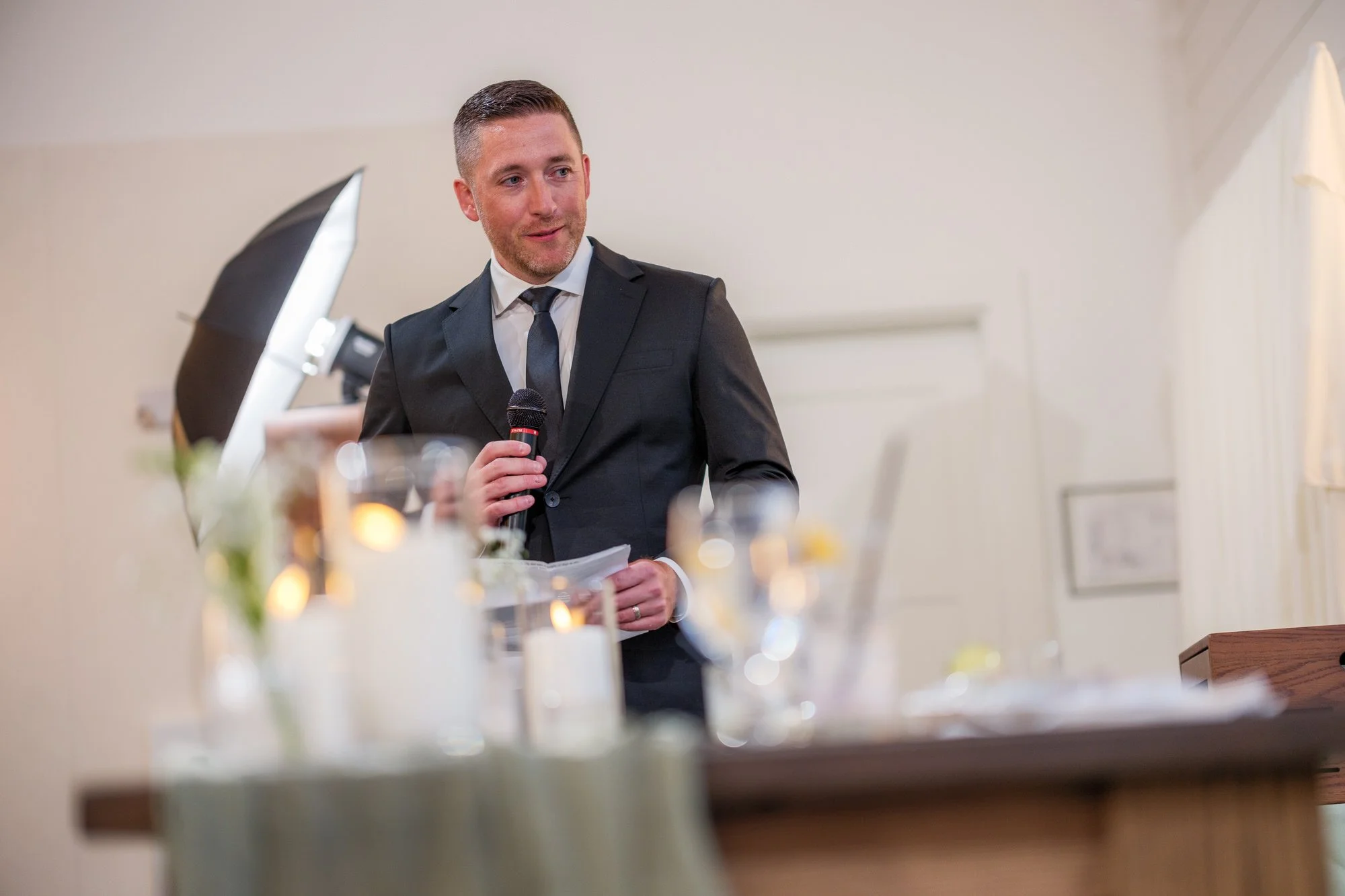 Groomsman giving wedding toast at Hyla Brook Estate reception