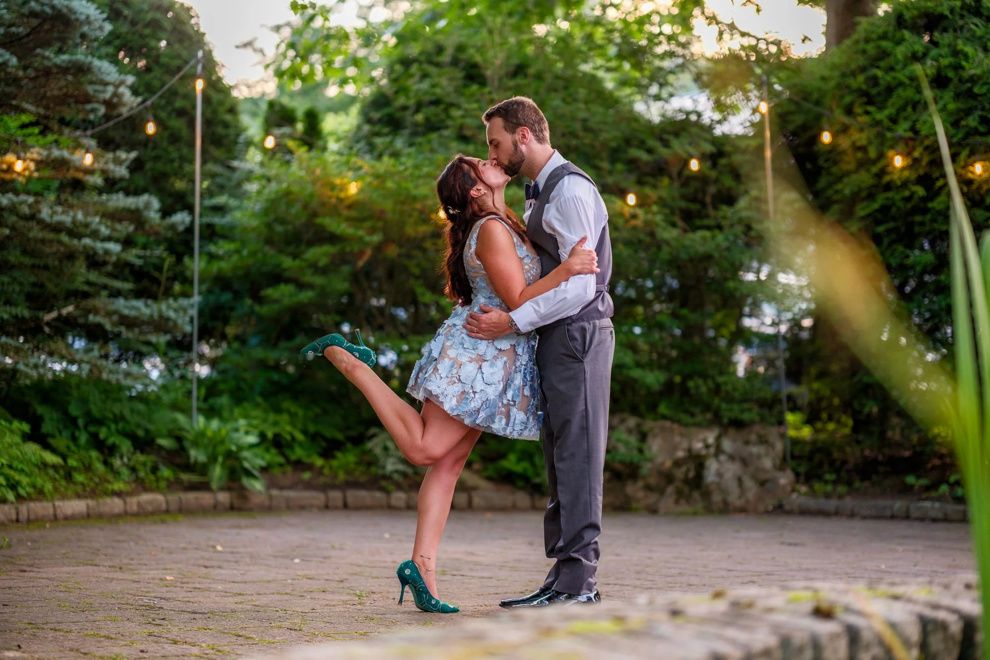 Bride and groom kiss during evening portraits at Lake Morey Resort