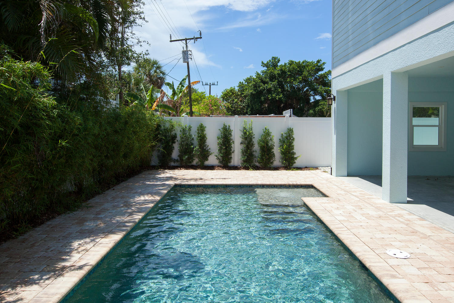 Backyard Pool in Pearl Street Cottage New Construction by Nease