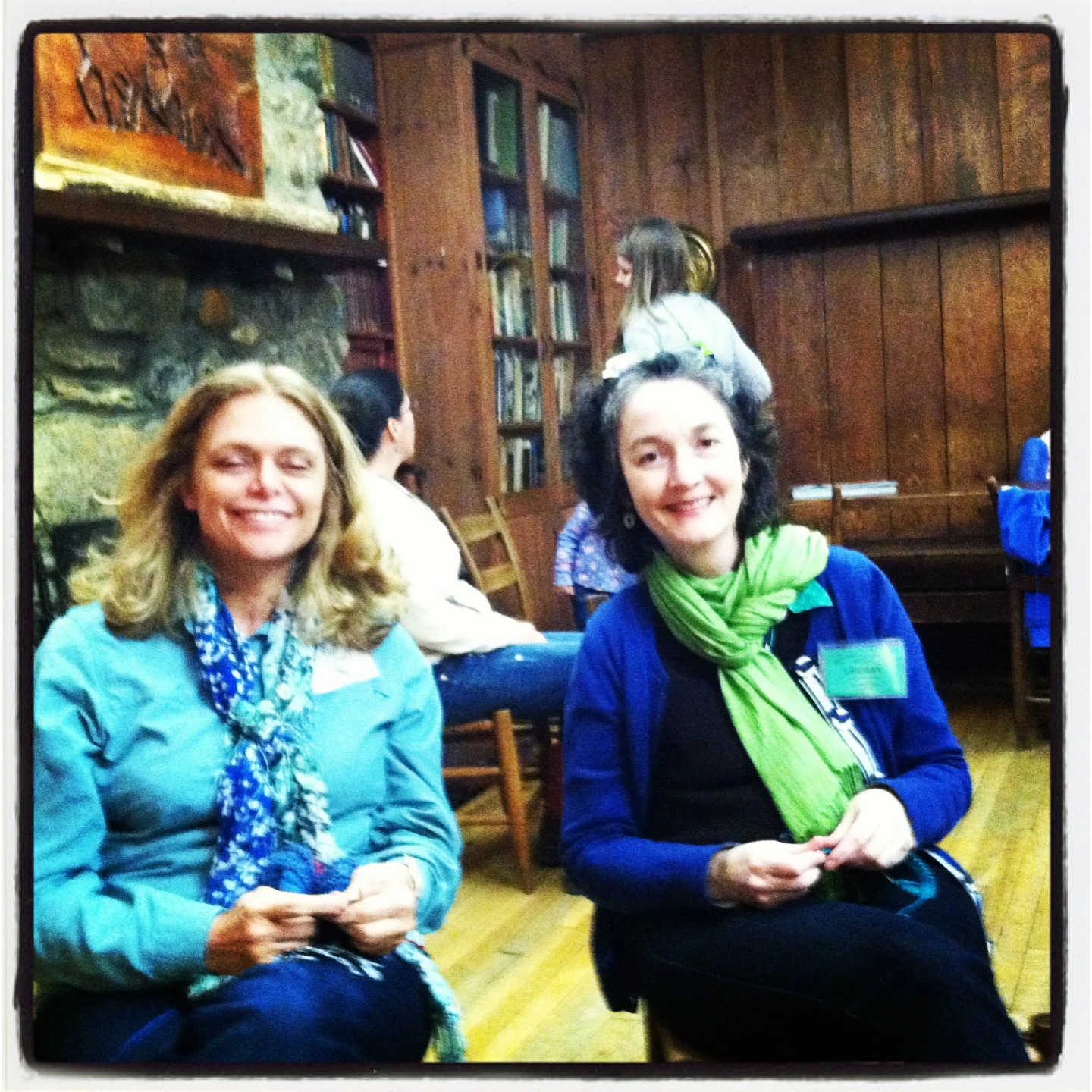 A student and I take a quiet moment while knitting berets.