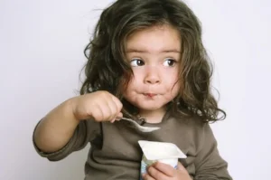 This little thin g is too cute. Don't know her name, but feel weird about sharing it here anyway. She didn't ask to model yogurt.