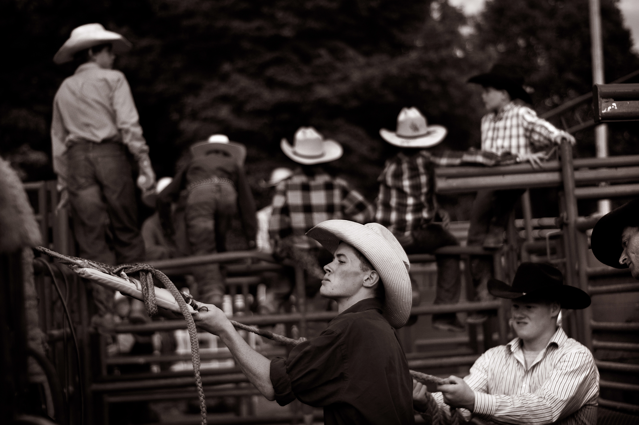 Young cowboys prepare their gear for the bull riding competition at the Fort Armstrong Championship Rodeo in Ford City, Pa.
