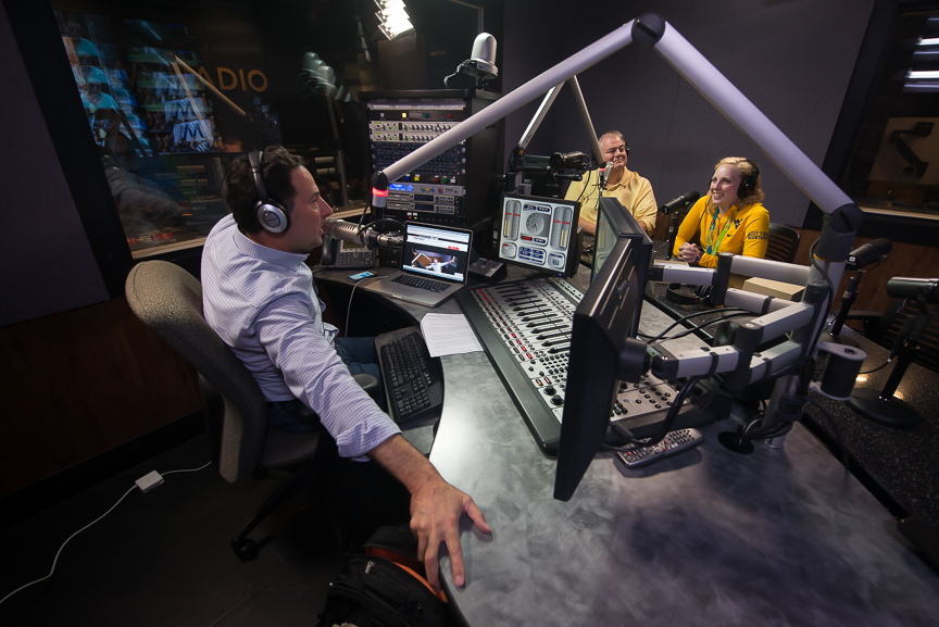 Ginny gets interviewed by MetroNews Radio Network's Tony Caridi, left, and Greg Hunter, right, in Morgantown on Wednesday, Aug. 17, 2016. 