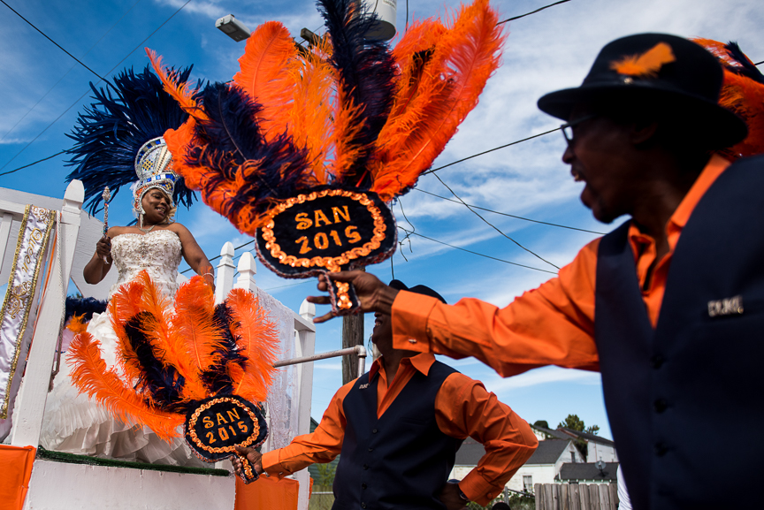 Men dance on a float with Queen Terry during the Prince of Wales second line parade in New Orleans on Oct. 9, 2016. 