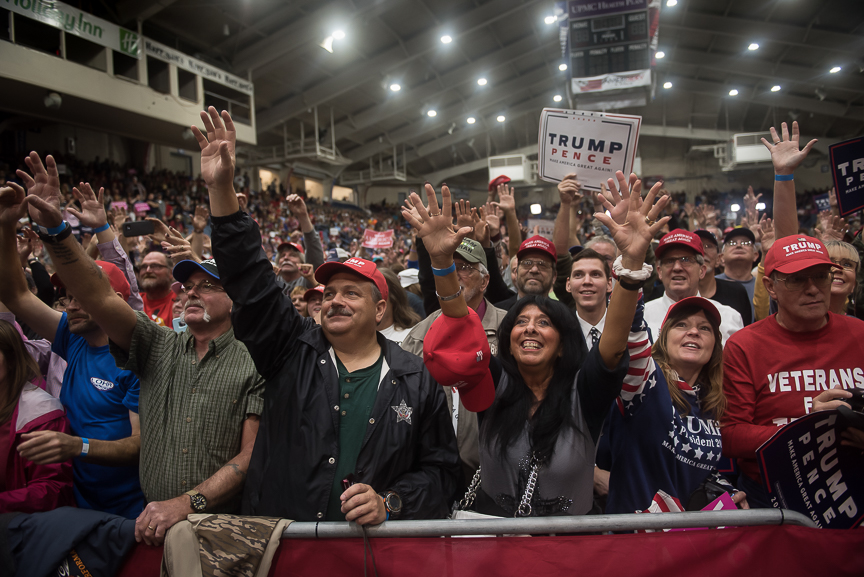 Donald Trump supporters cheer at a campaign stop at the Cambria County War Memorial Arena on October 21, 2016 in Johnstown, Pennsylvania. Trump and Democratic presidential nominee Hillary Clinton continue to campaign as Election Day nears. 