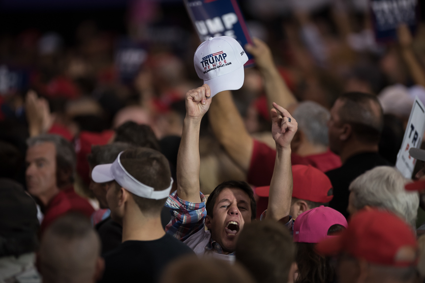 A Trump supporters yells at members of the media during Republican presidential nominee Donald Trump's campaign stop at the International Exposition Center on October 22, 2016 in Cleveland, Ohio. 