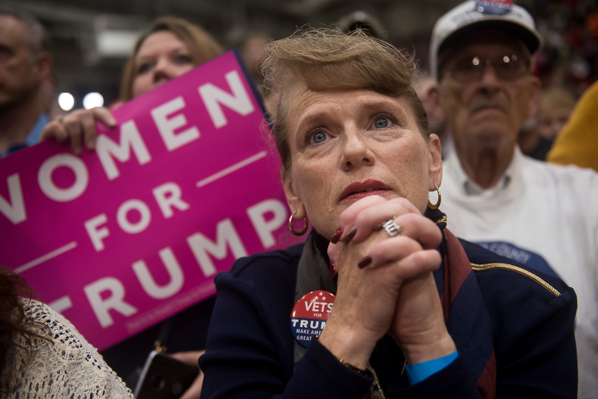 A supporter of Republican presidential candidate Donald Trump listens on as he speaks during a campaign stop at the Cambria County War Memorial Arena on October 21, 2016 in Johnstown, Pennsylvania. 