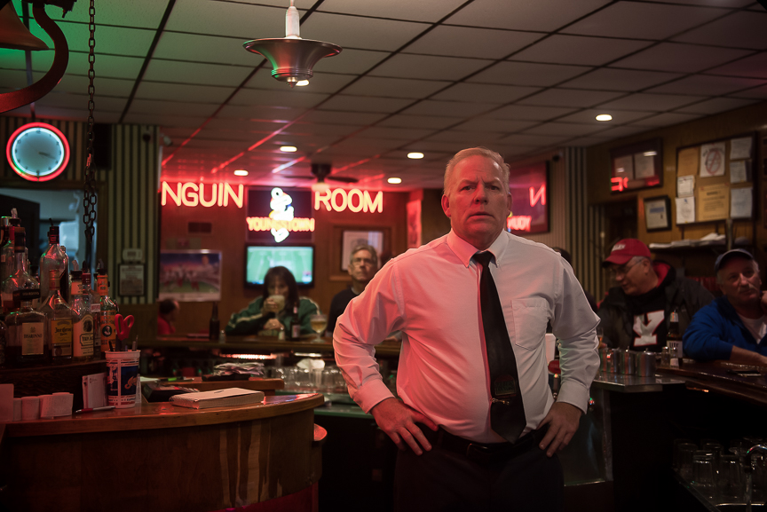Phillip Naples stands behind the bar at the Golden Dawn in Youngstown, Ohio on Nov. 19, 2016.