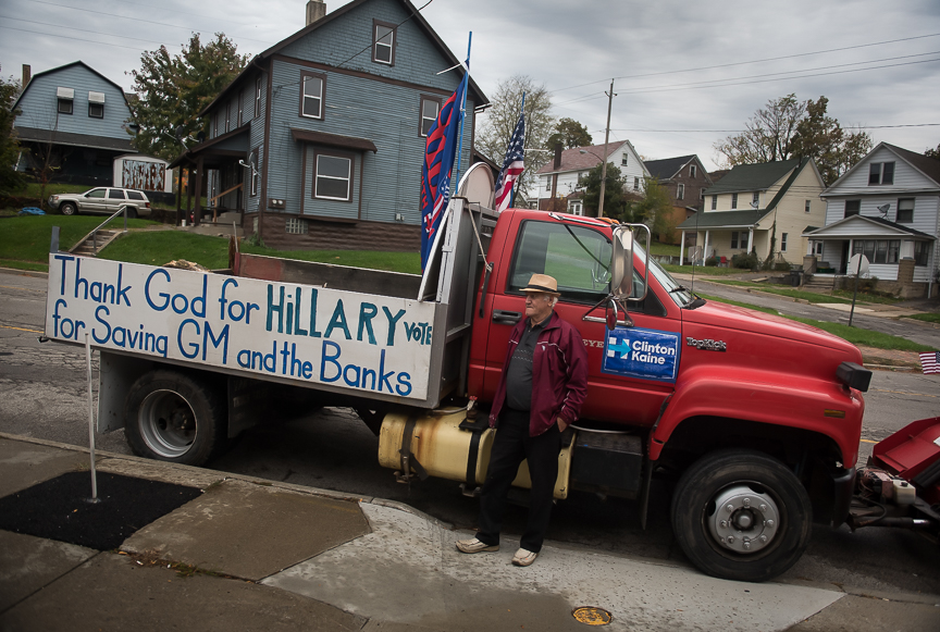 Carl Venzeio, 77, a self-proclaimed supporter of Democratic presidential nominee Hillary Clinton, stands in front of his trunk in Youngstown, Ohio on Oct. 26, 2016.