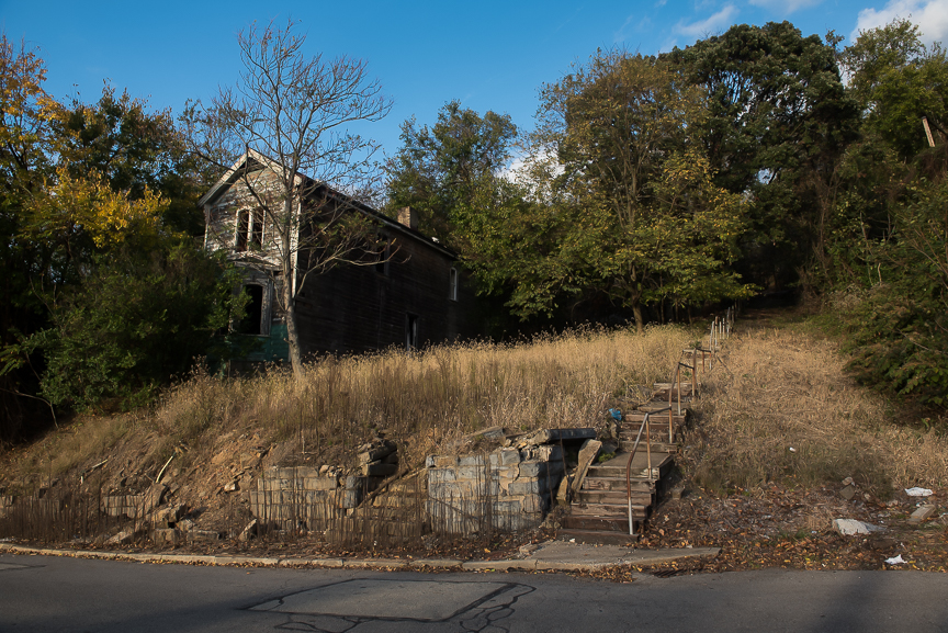 Steps lead to a vacant lot where a home once stood in McKeesport, Pa., on Oct. 25, 2016.