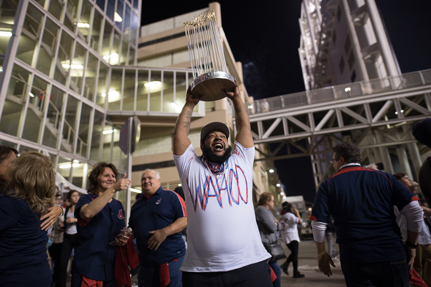 Demilles Jones, 35, of Cleveland holds a homemade World Series trophy outside of Progressive Field during game 6 of the World Series on November 1, 2016 in Cleveland, Ohio. 