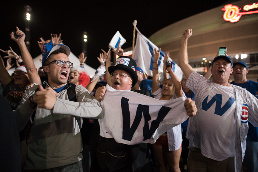 Cubs fans celebrate after the Chicago Cubs defeated the Cleveland Indians 8-7 in game 7 of the World Series on November 3, 2016 in Cleveland, Ohio. 