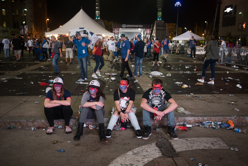 Indian fans sit outside of Progressive Field after the Chicago Cubs beat the Cleveland Indians 8-7 in game 7 of the World Series on November 3, 2016 in Cleveland, Ohio. 